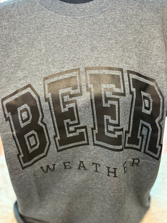 Dark heather heat press t-shirt with 'BEER WEATHER' text in black