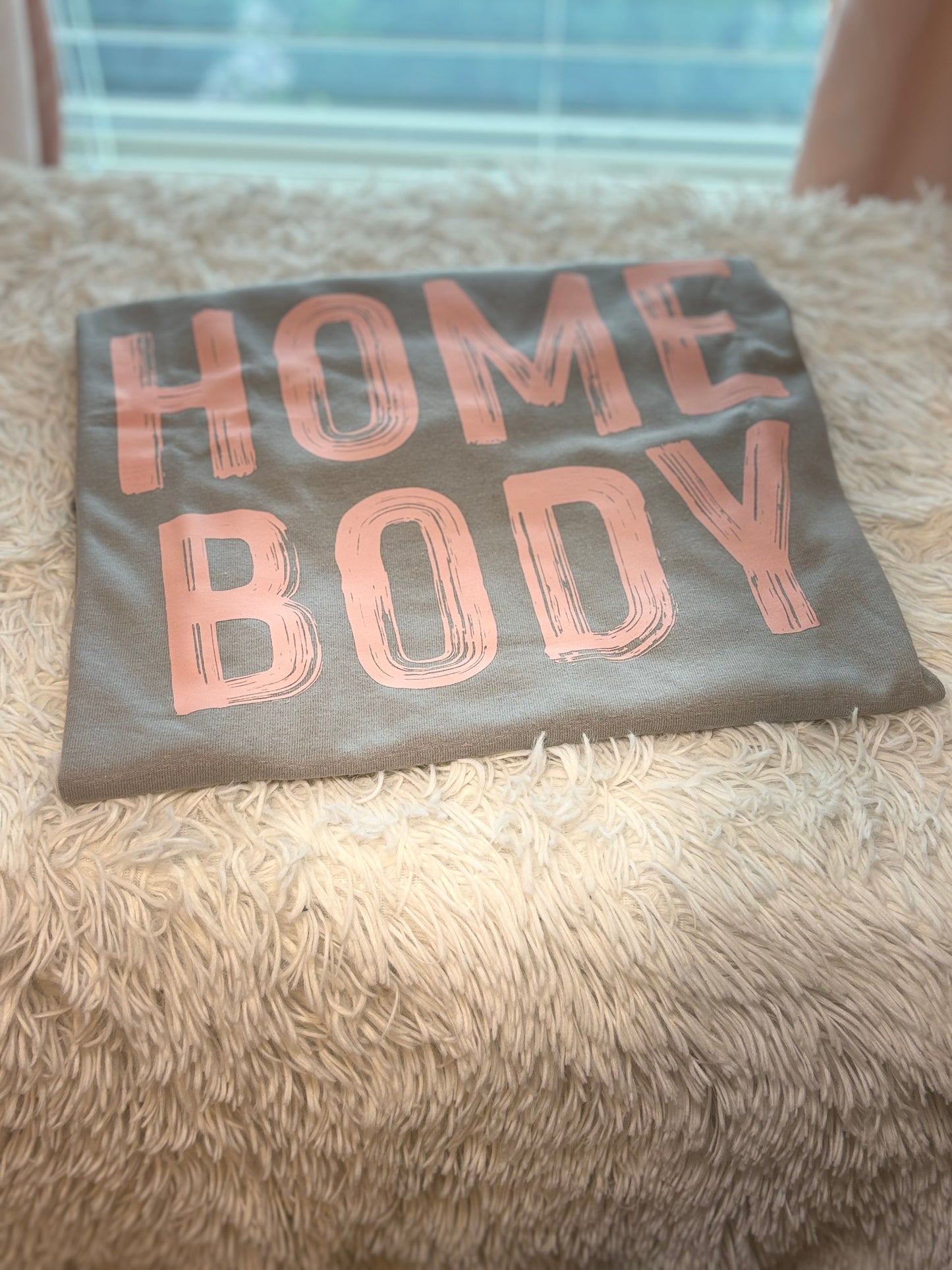Gray heat press t-shirt with 'HOME BODY' text in pink