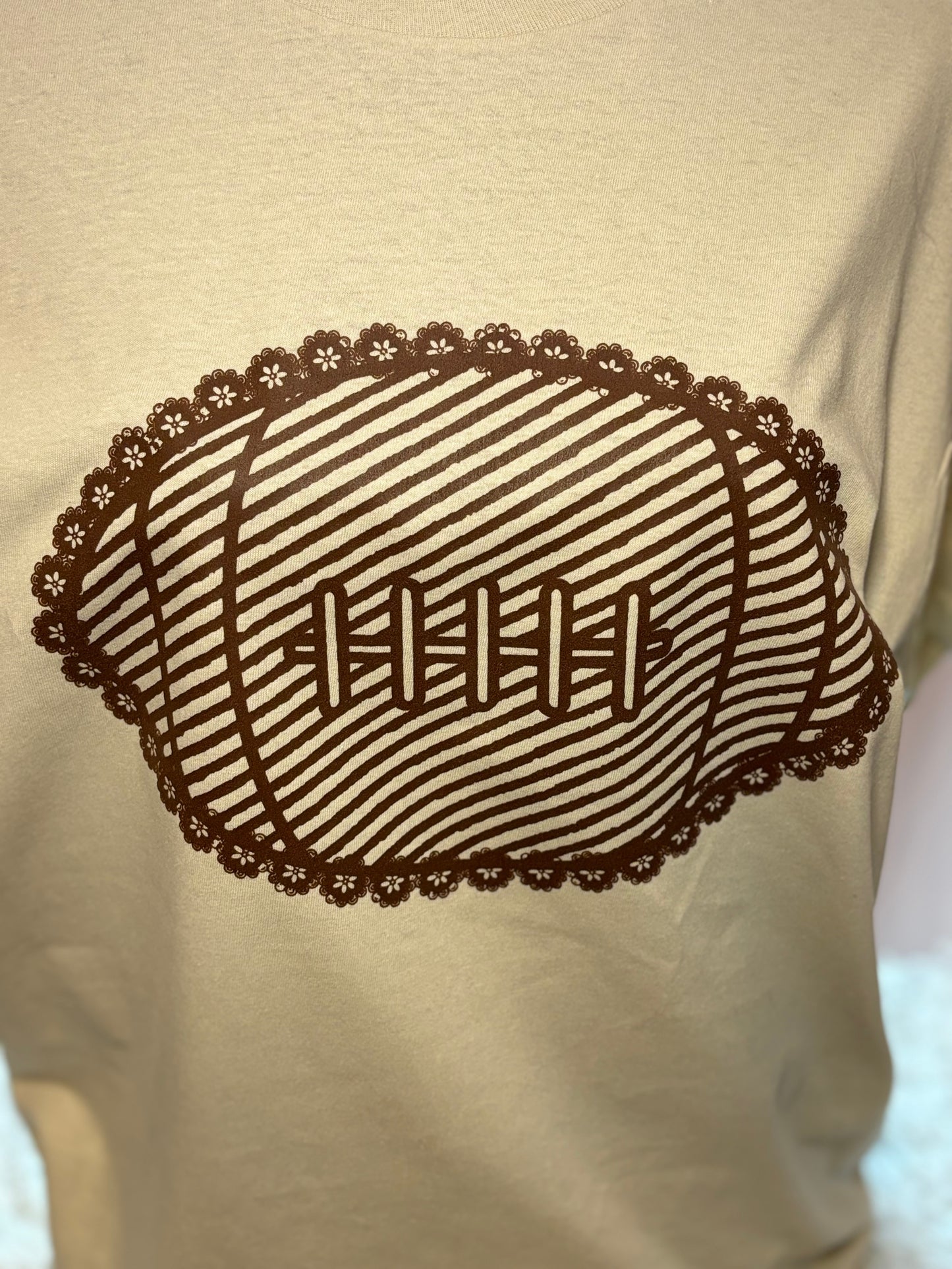Brown Lace Football heat press t-shirt in tan