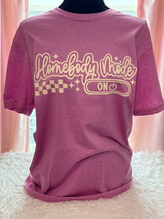 Heather Orchid heat press t-shirt with 'Homebody Mode ON' text in beige
