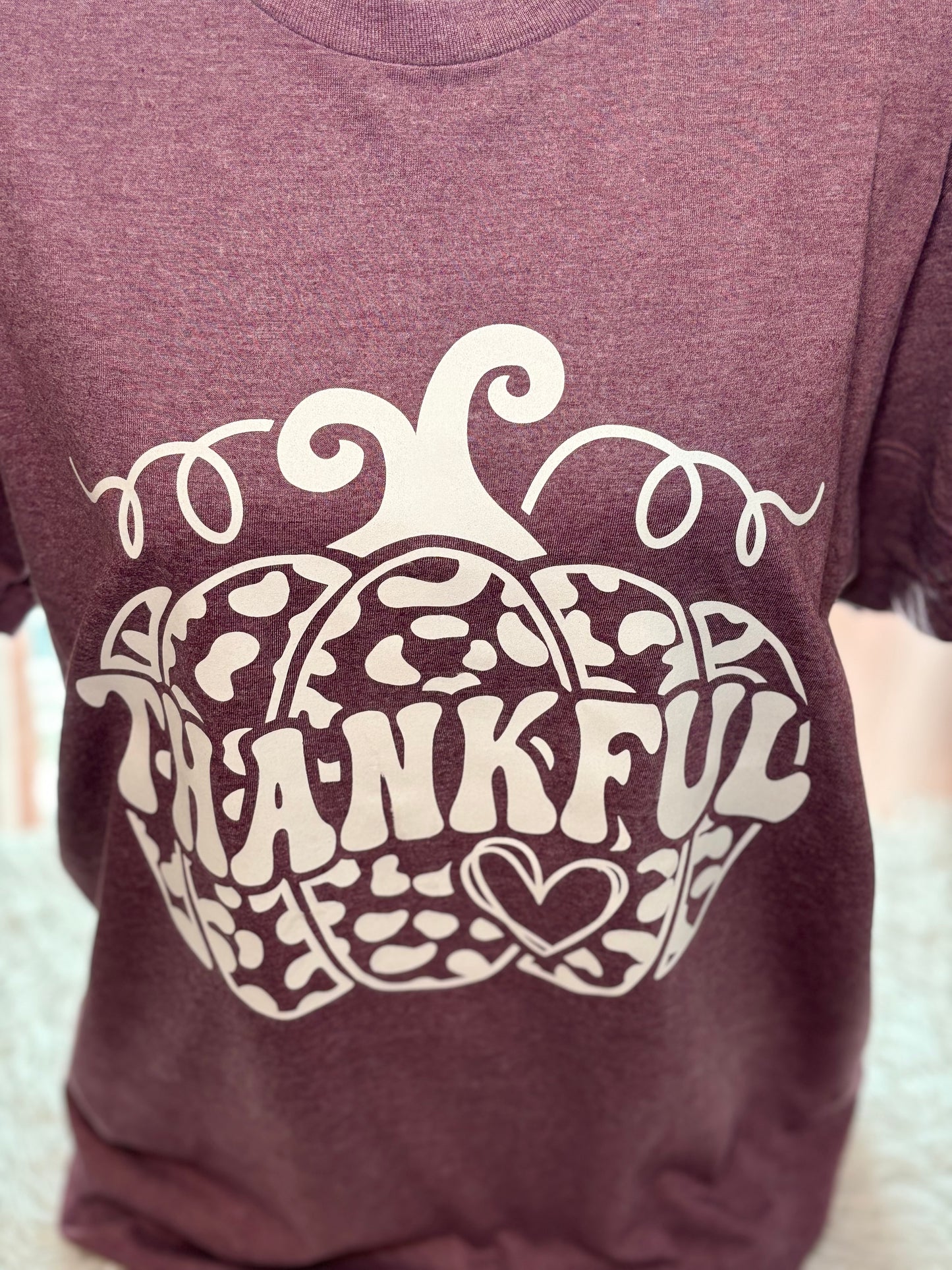 Heather maroon heat press t-shirt with 'THANKFUL' printed in white