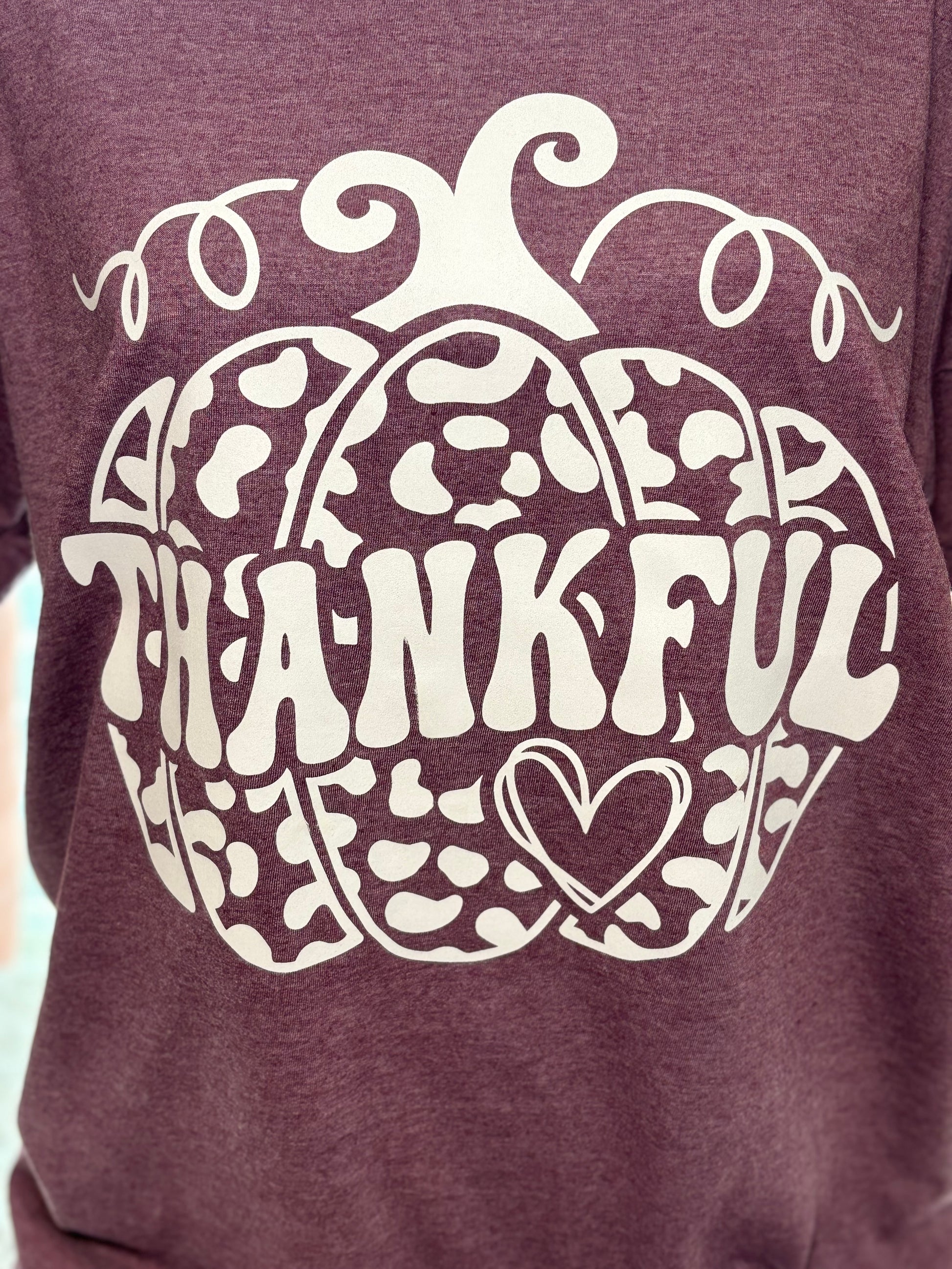 Heather maroon heat press t-shirt with 'THANKFUL' printed in white