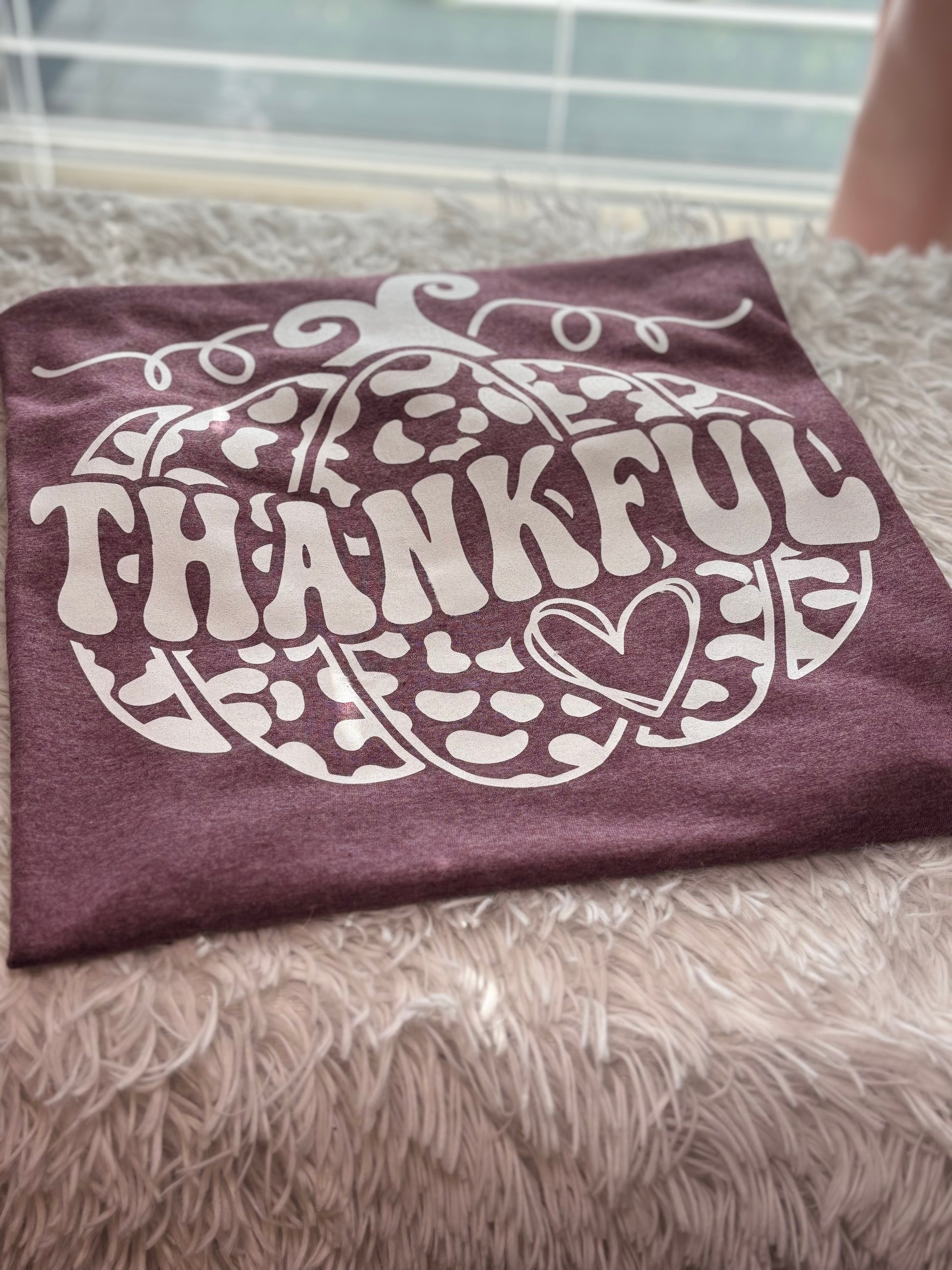 Heather maroon heat press t-shirt with 'THANKFUL' printed in white