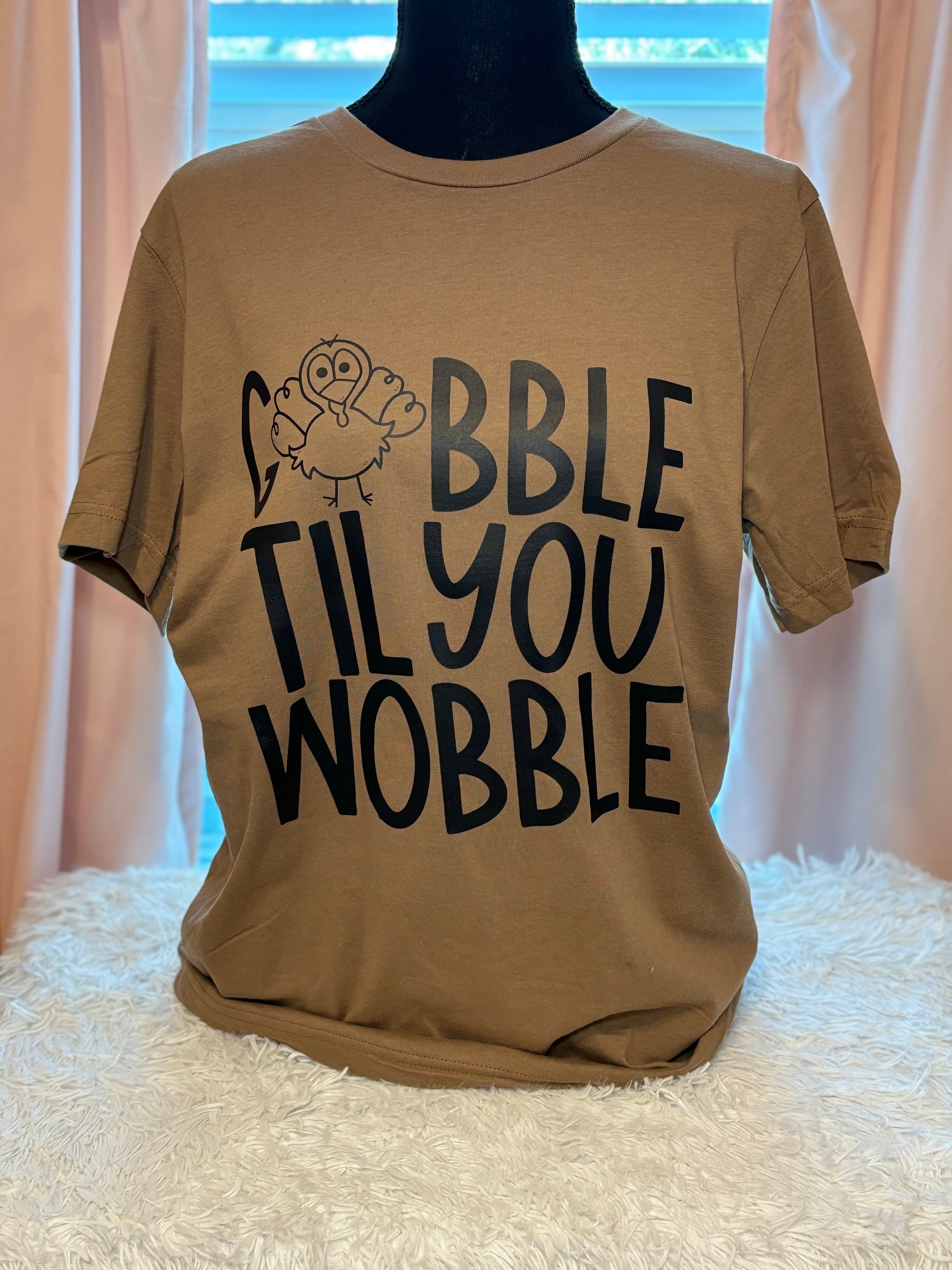 Brown heat press t-shirt with 'Gobble Til You Wobble' text and a turkey graphic