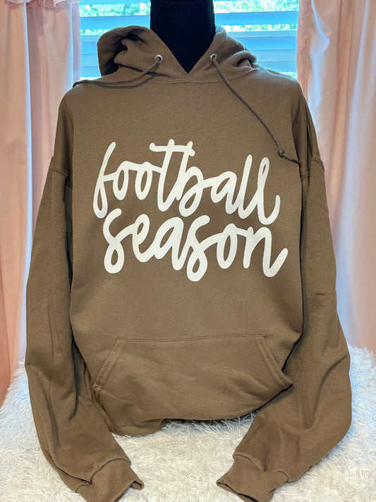 Dark tan hoodie with heat press 'football season' text in white