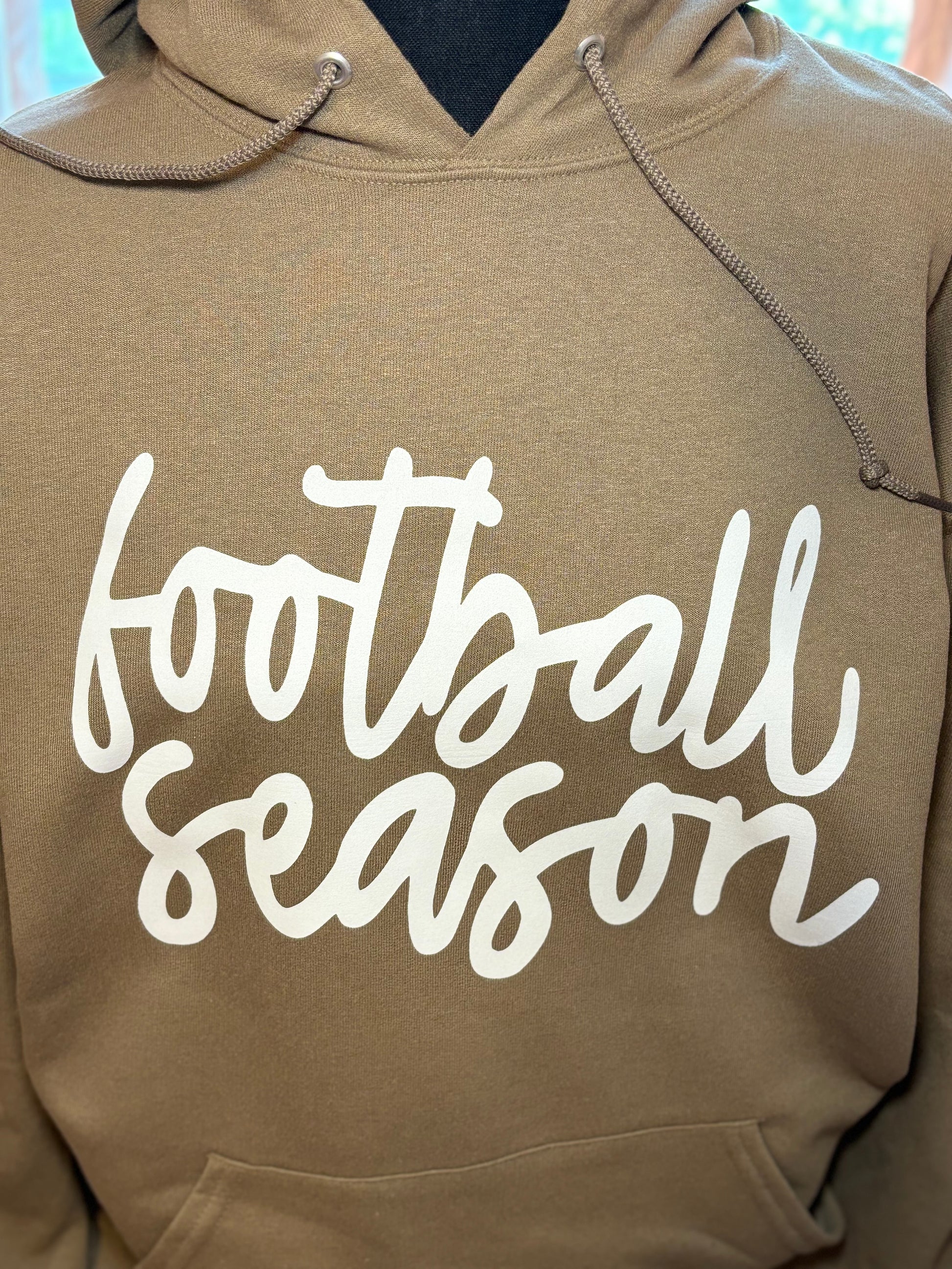 Dark tan hoodie with heat press 'football season' text in white