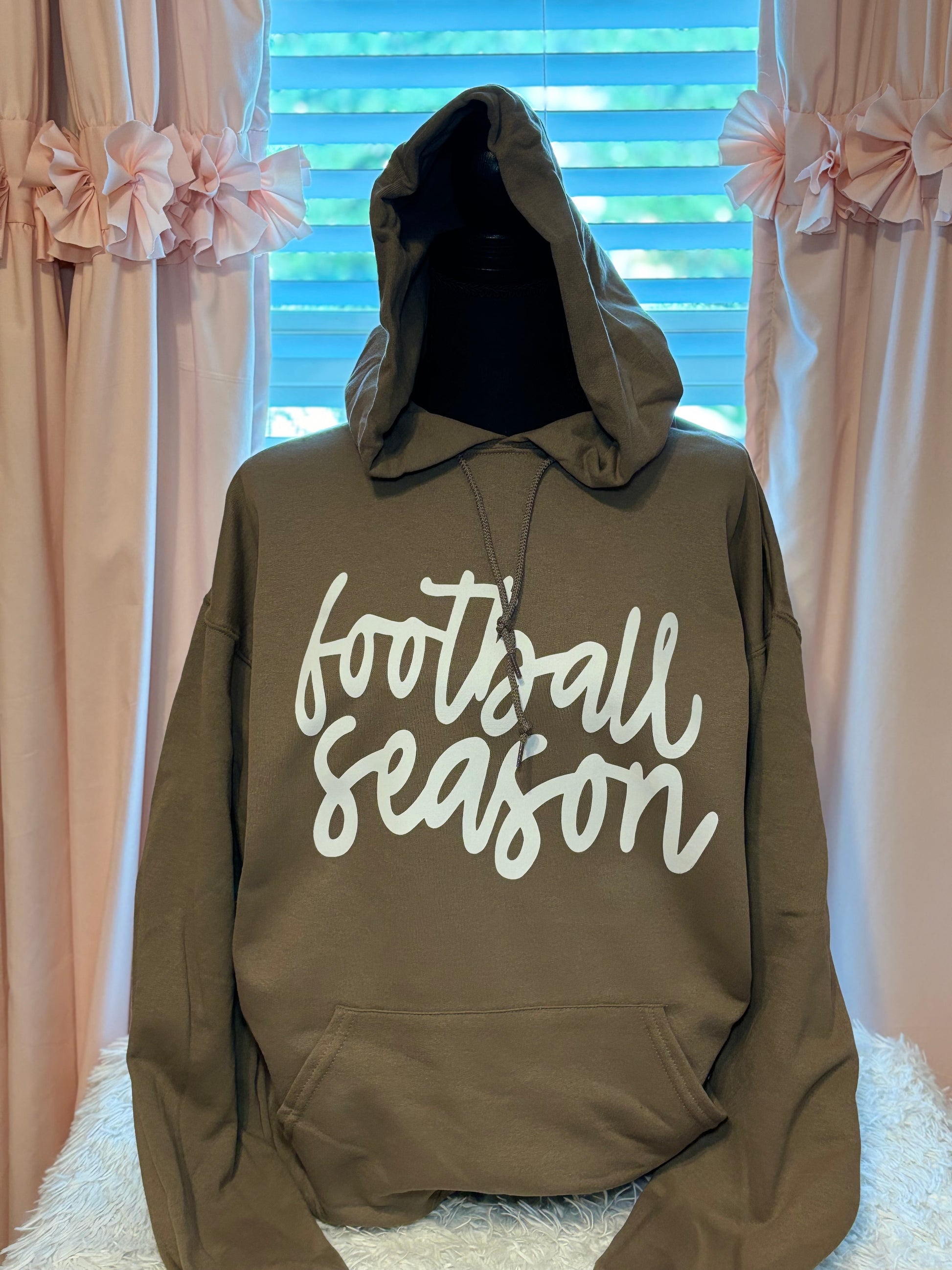 Dark tan hoodie with heat press 'football season' text in white