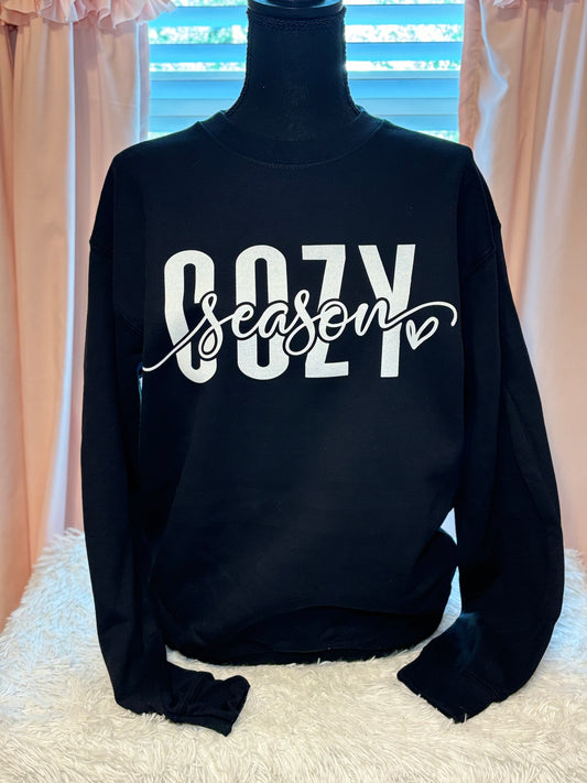 Black heat press sweatshirt with 'Cozy Season' text in white