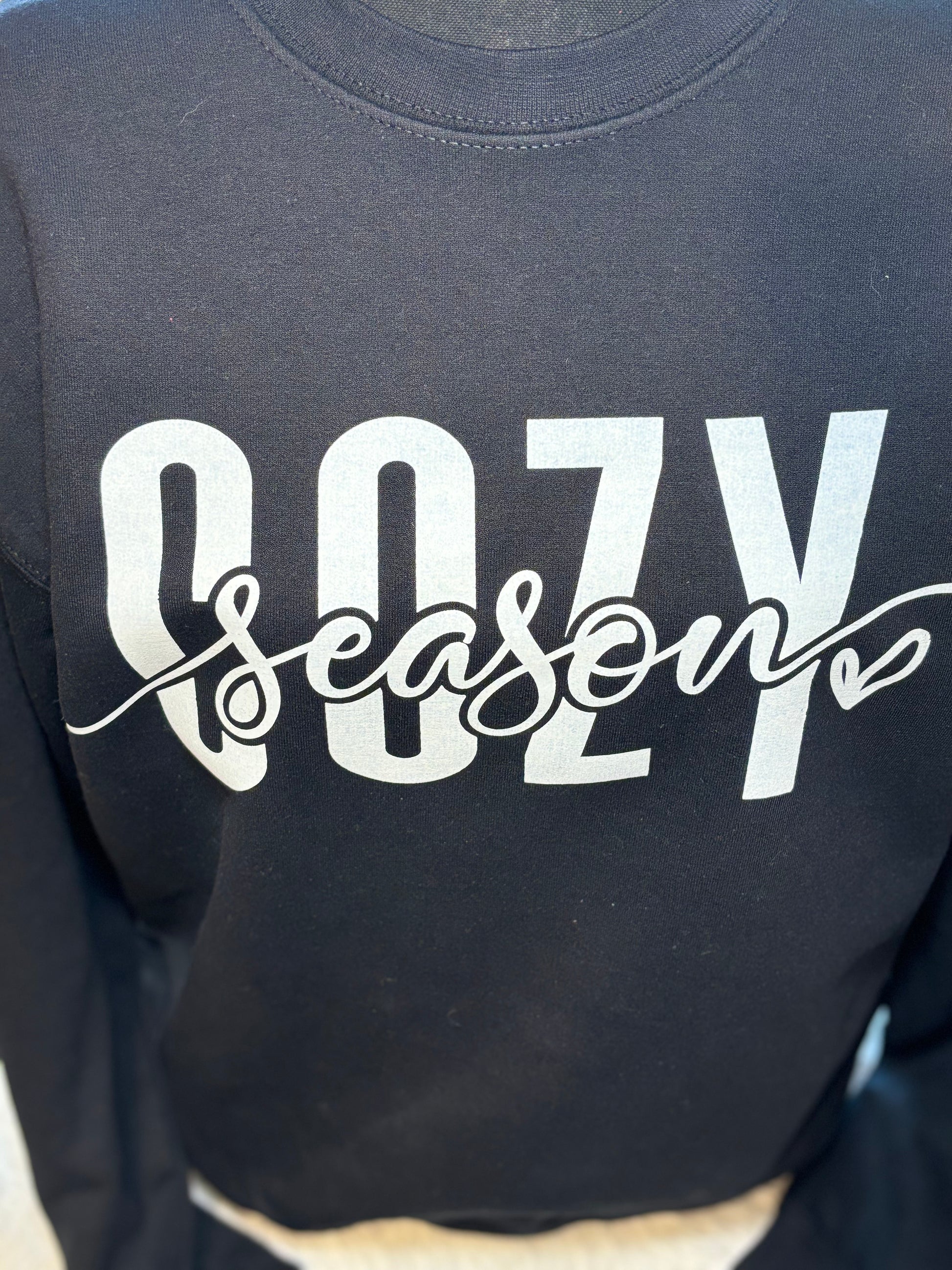 Black heat press sweatshirt with 'Cozy Season' text in white