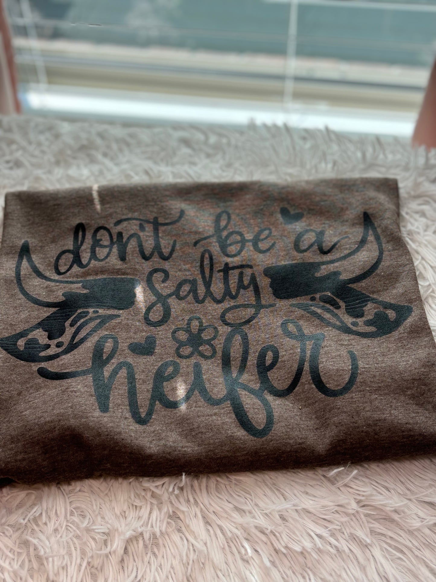 Heather brown heat press t-shirt with 'Don't be a Salty Heifer' text in black