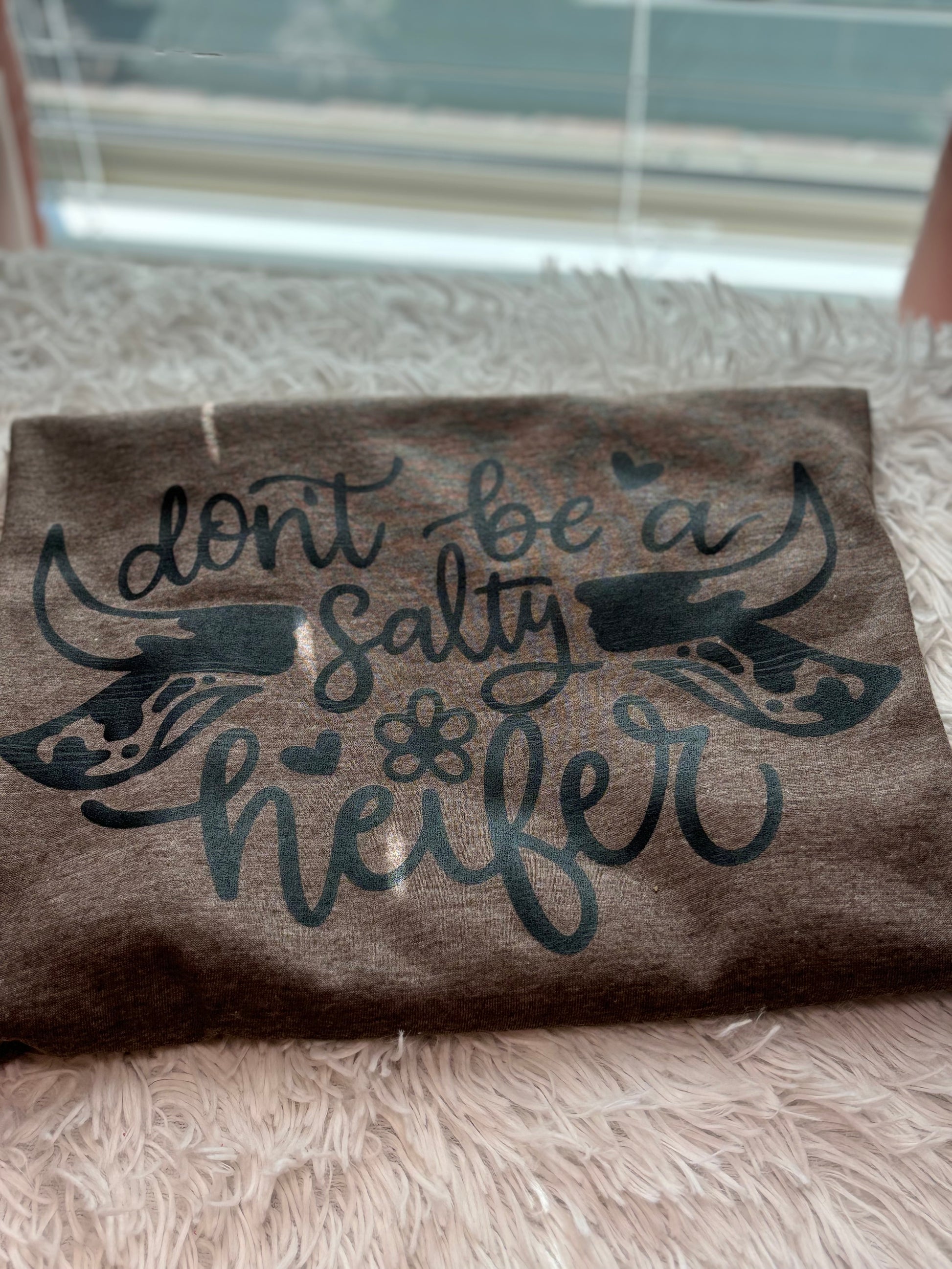 Heather brown heat press t-shirt with 'Don't be a Salty Heifer' text in black