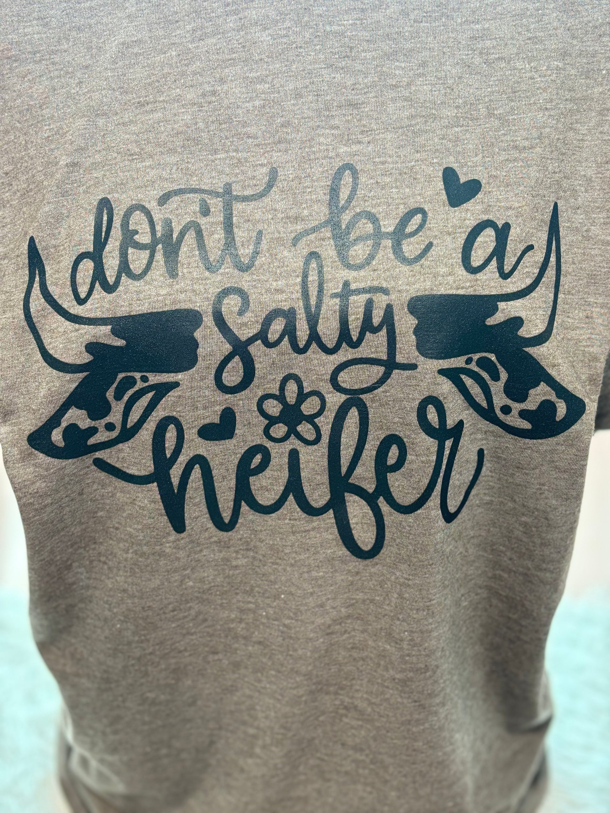 Heather brown heat press t-shirt with 'Don't be a Salty Heifer' text in black