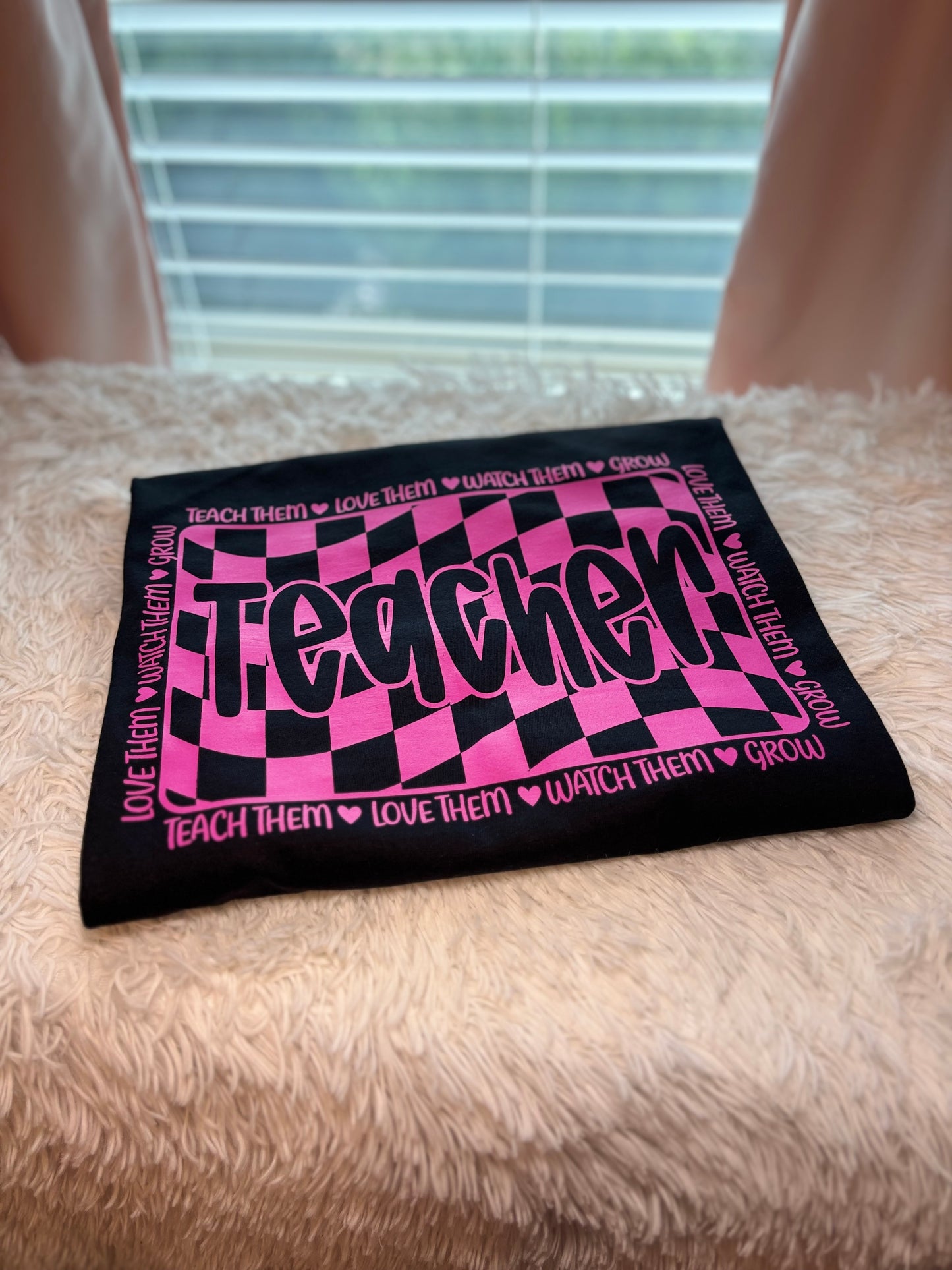Pink and black checkered heat press t-shirt with 'Teacher' text
