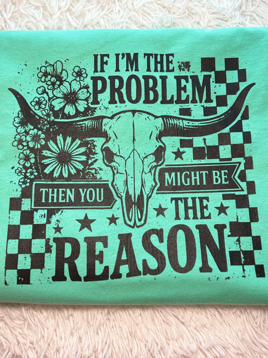 Mint heat press t-shirt with bull skull design and text "If I'm The Problem Then You Might Be The Reason" on a checkered background