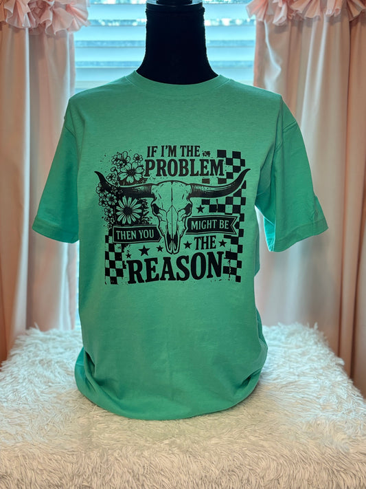 Mint heat press t-shirt with bull skull design and text "If I'm The Problem Then You Might Be The Reason" on a checkered background