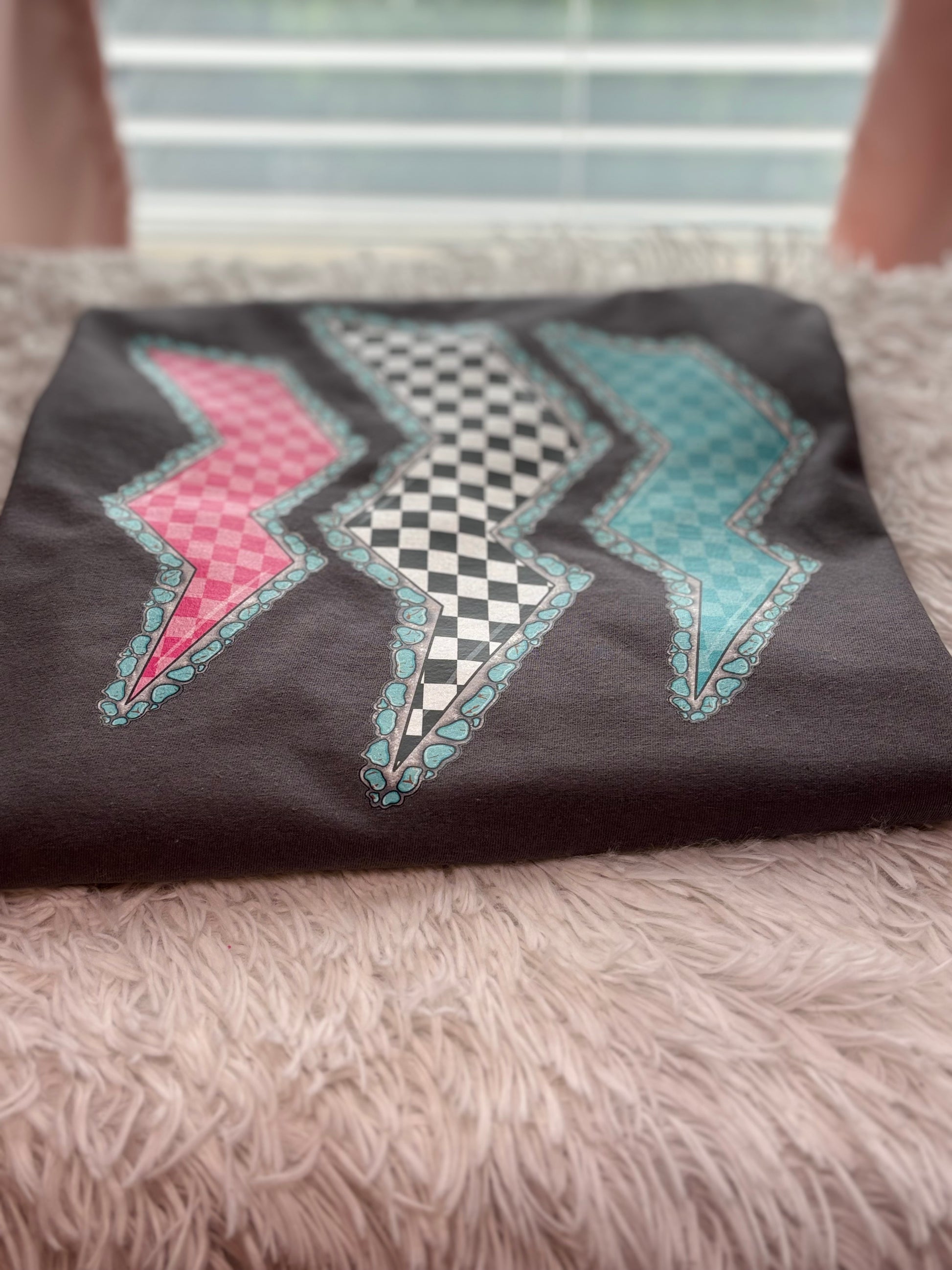 Charcoal heat press t-shirt with colorful lightning bolt designs