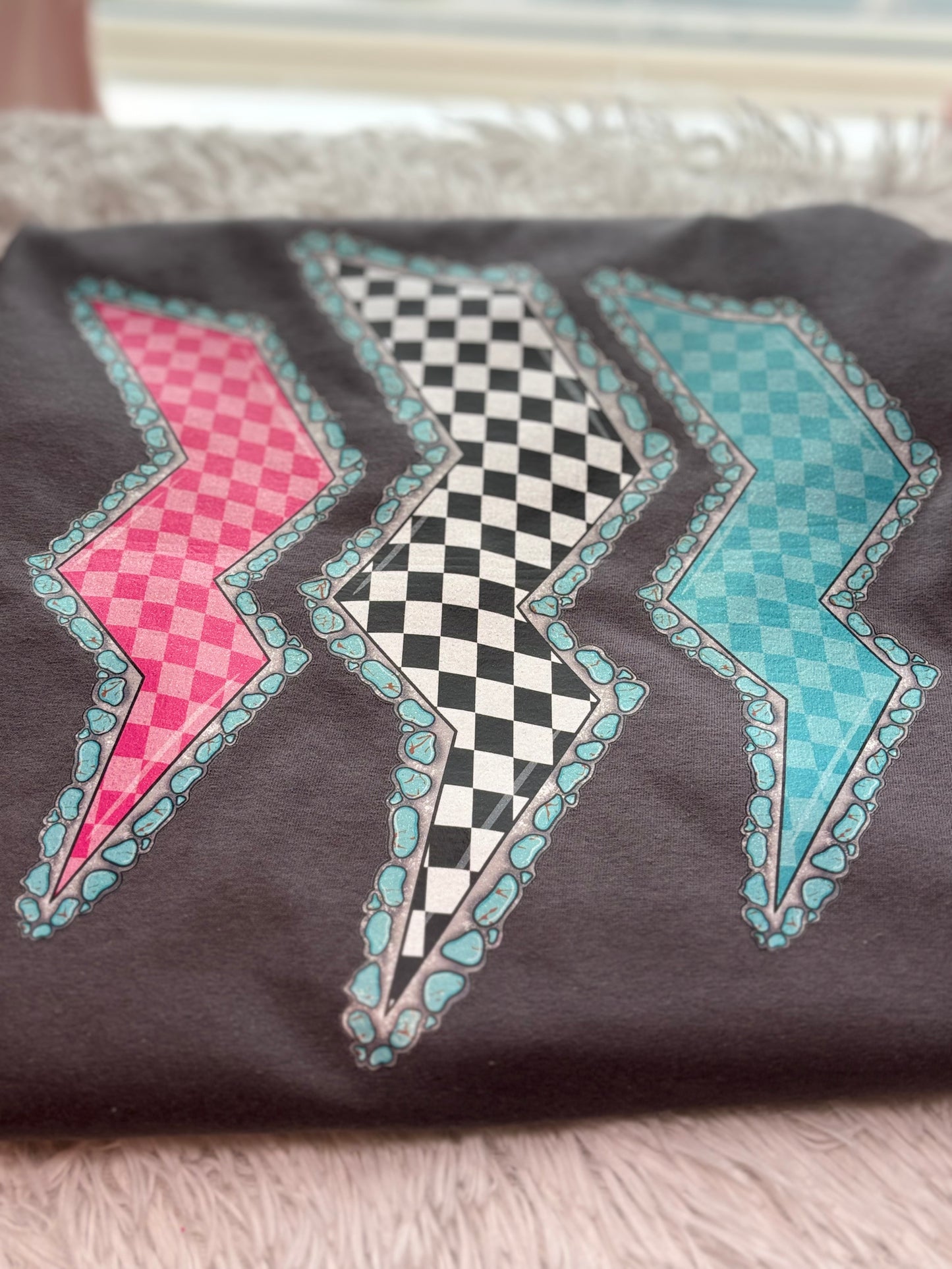 Charcoal heat press t-shirt with colorful lightning bolt designs