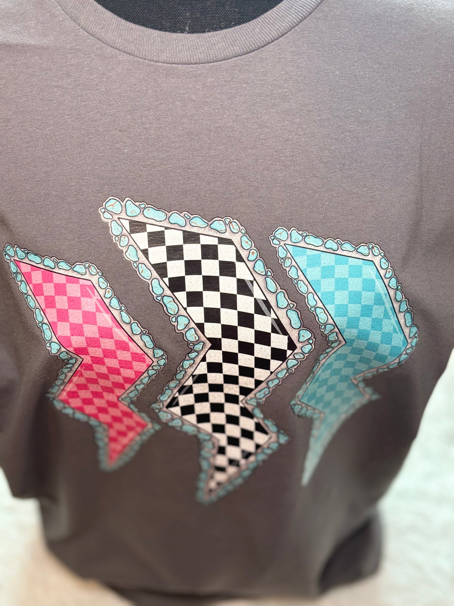 Charcoal heat press t-shirt with colorful lightning bolt designs