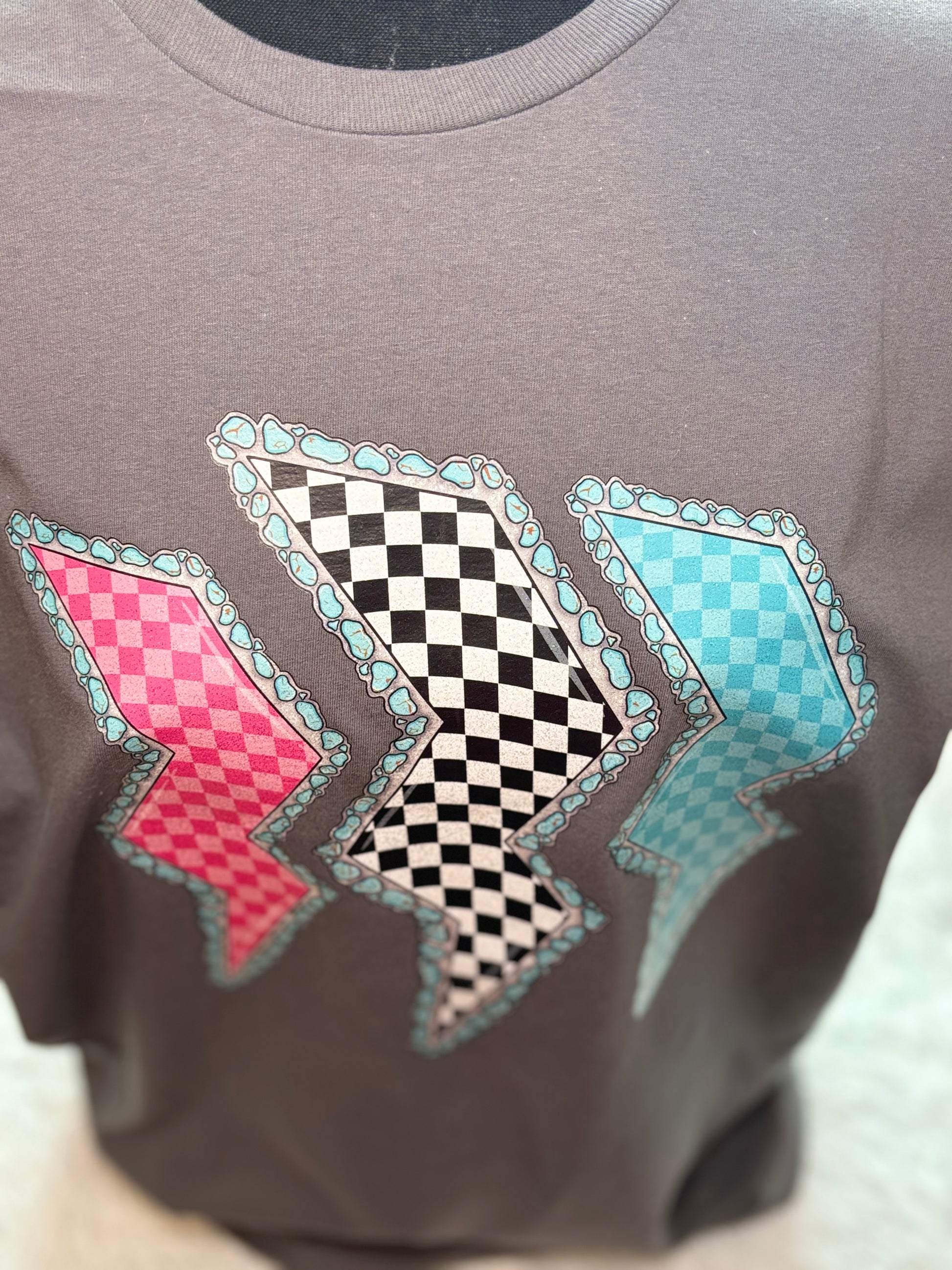 Charcoal heat press t-shirt with colorful lightning bolt designs