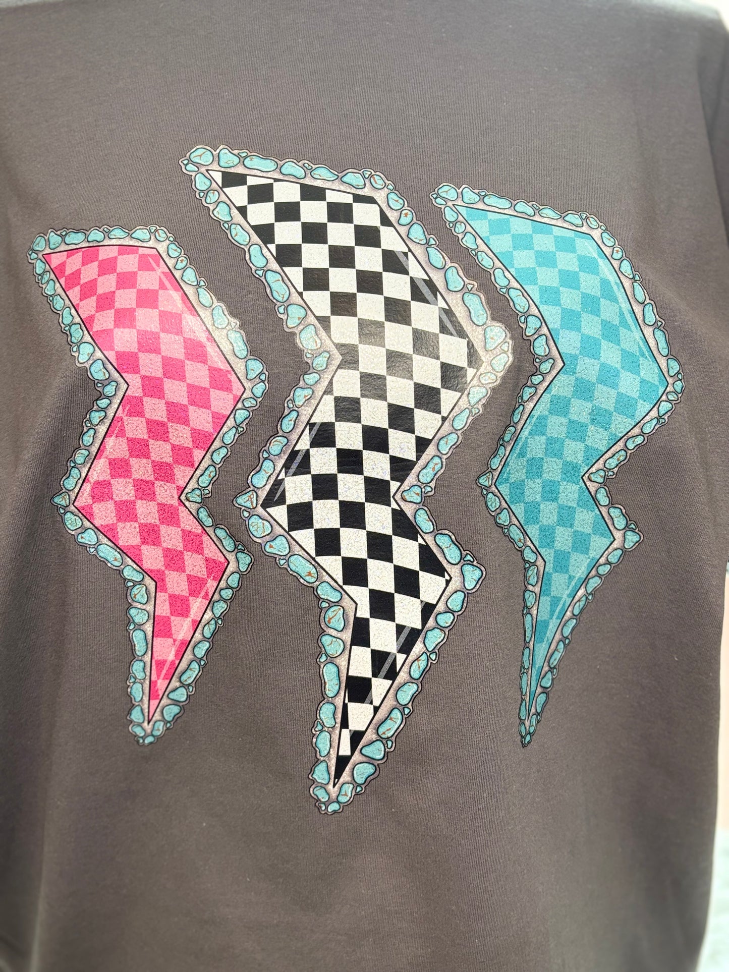 Charcoal heat press t-shirt with colorful lightning bolt designs