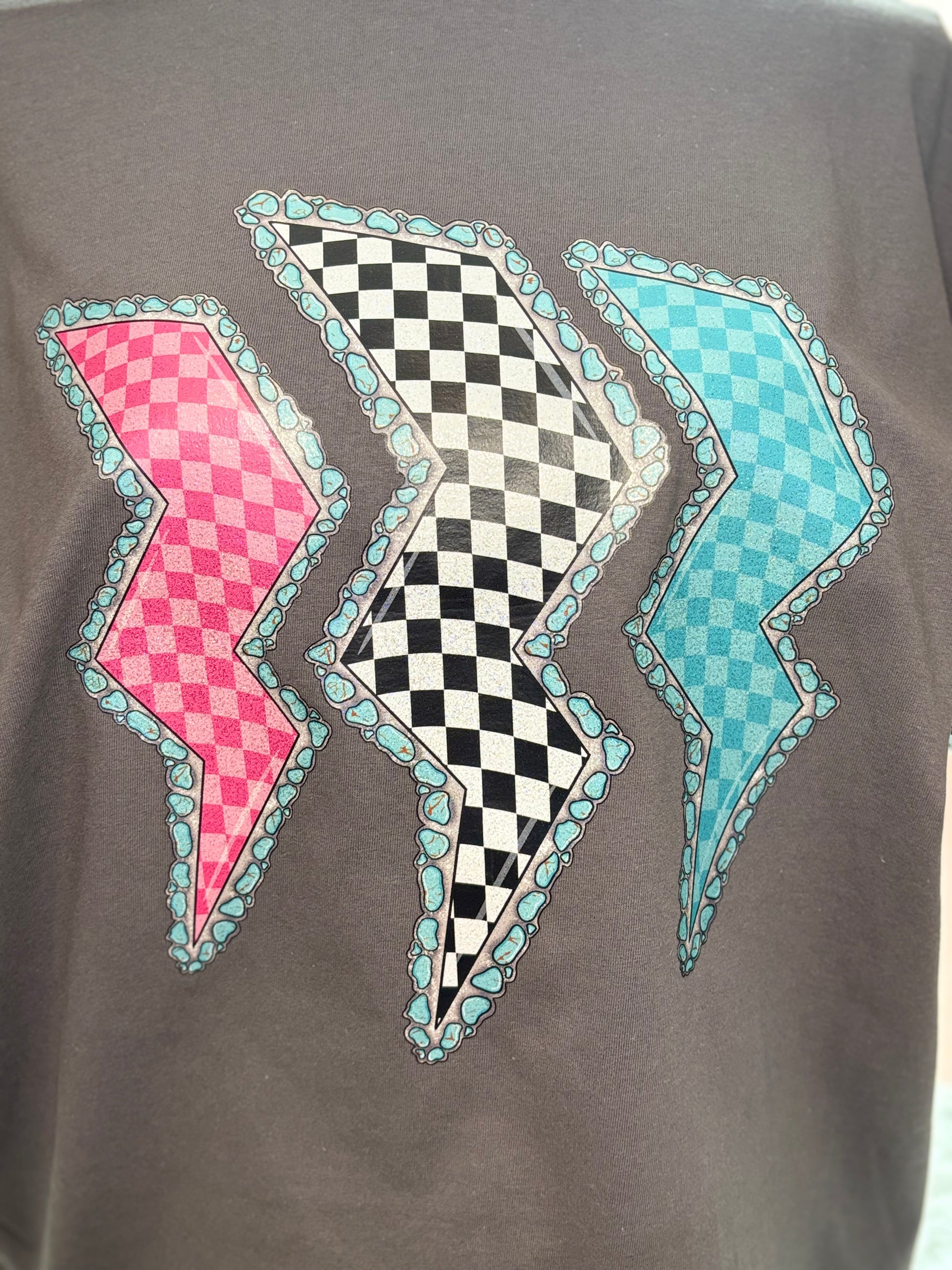Charcoal heat press t-shirt with colorful lightning bolt designs