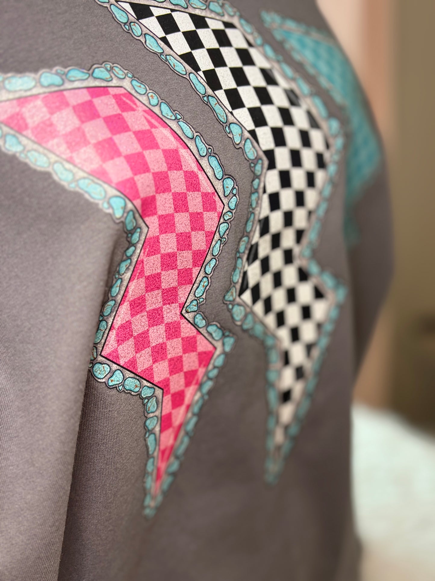 Charcoal heat press t-shirt with colorful lightning bolt designs