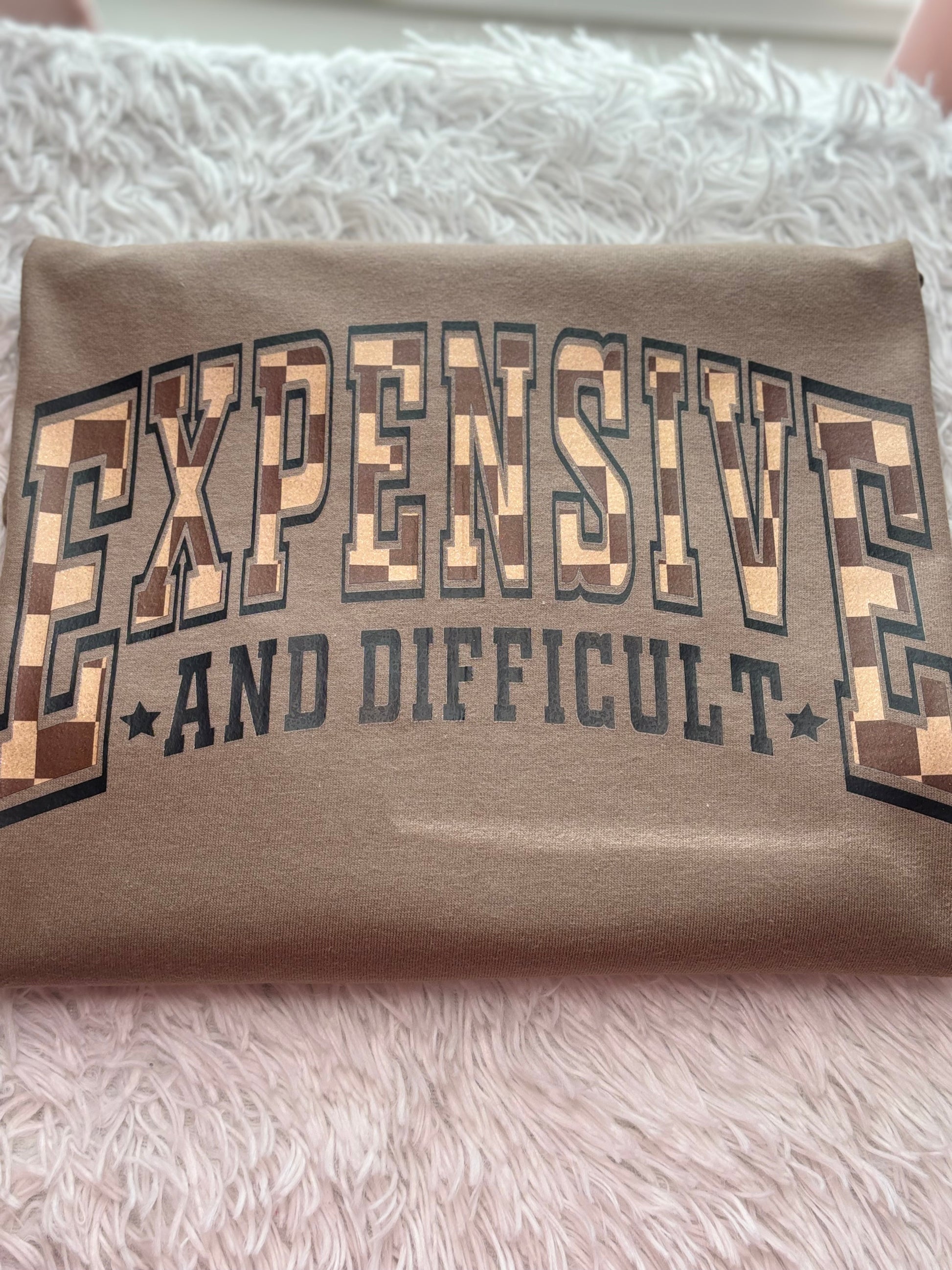 Brown heat press t-shirt with text 'EXPENSIVE AND DIFFICULT' - checkered