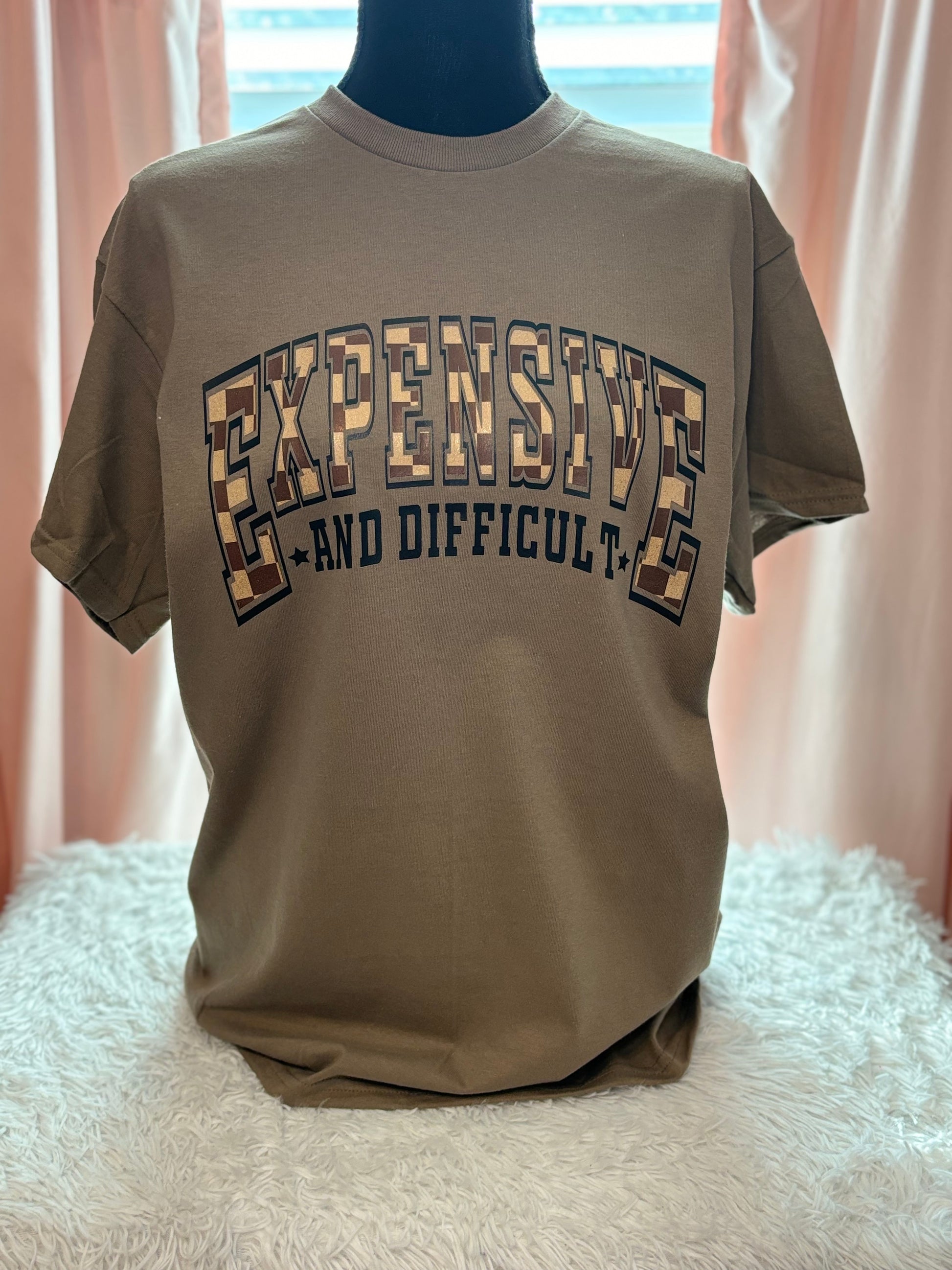 Brown heat press t-shirt with text 'EXPENSIVE AND DIFFICULT' - checkered