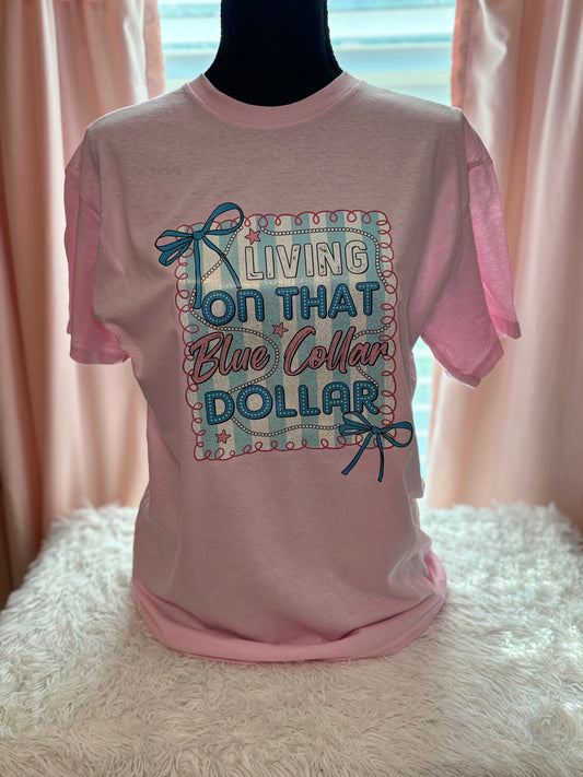 Pink heat press t-shirt with "Living on that Blue Collar Dollar" text and decorative elements