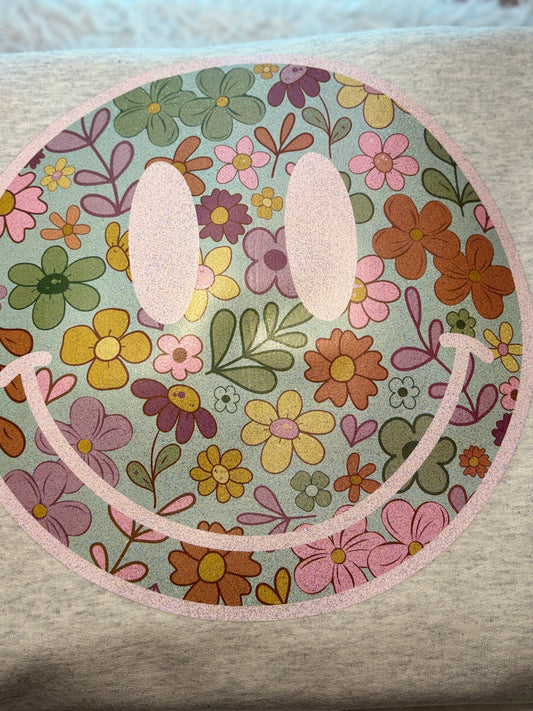 Heat press boho floral patterned face on an oatmeal heather sweatshirt