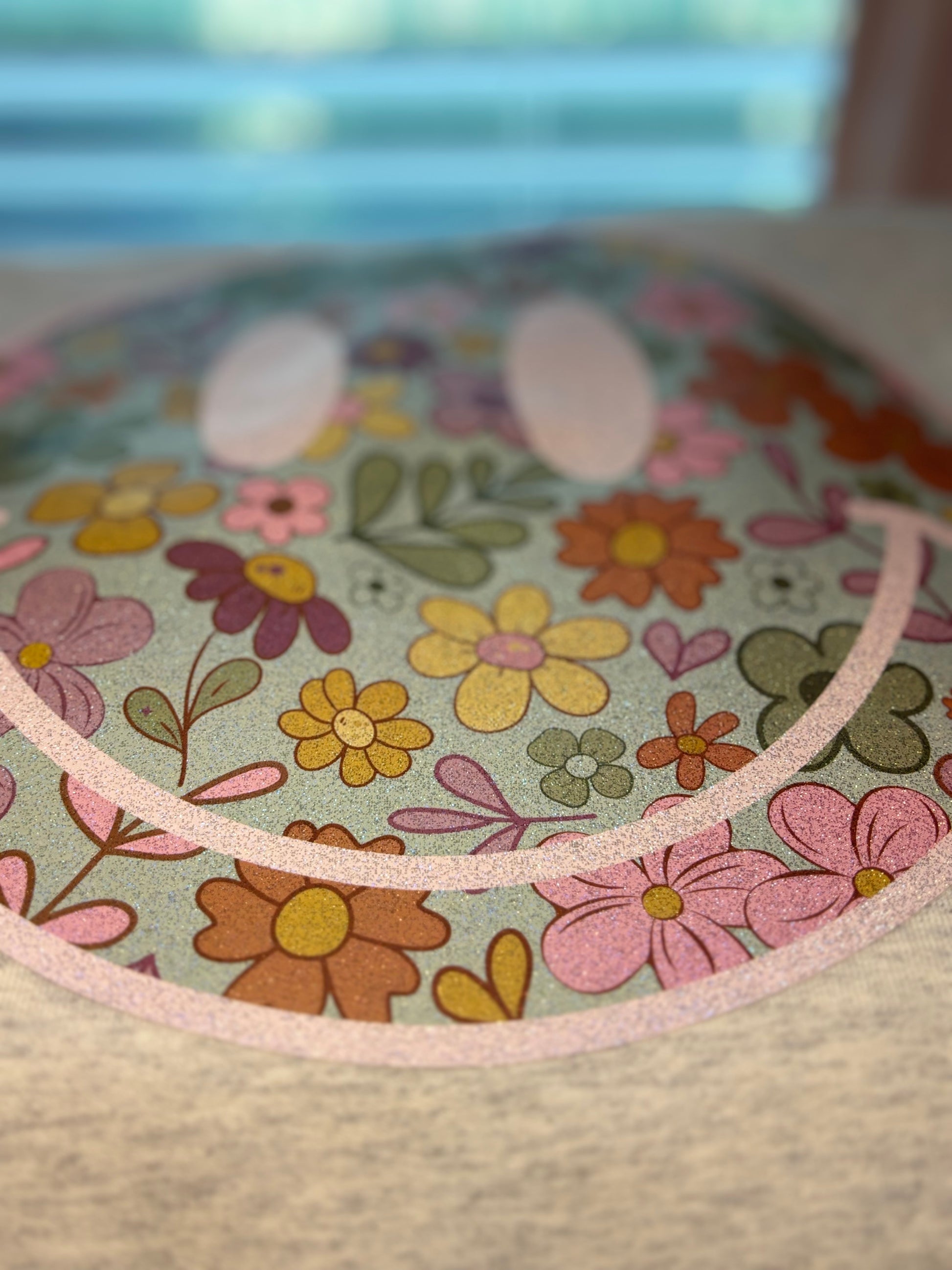 Heat press boho floral patterned face on an oatmeal heather sweatshirt