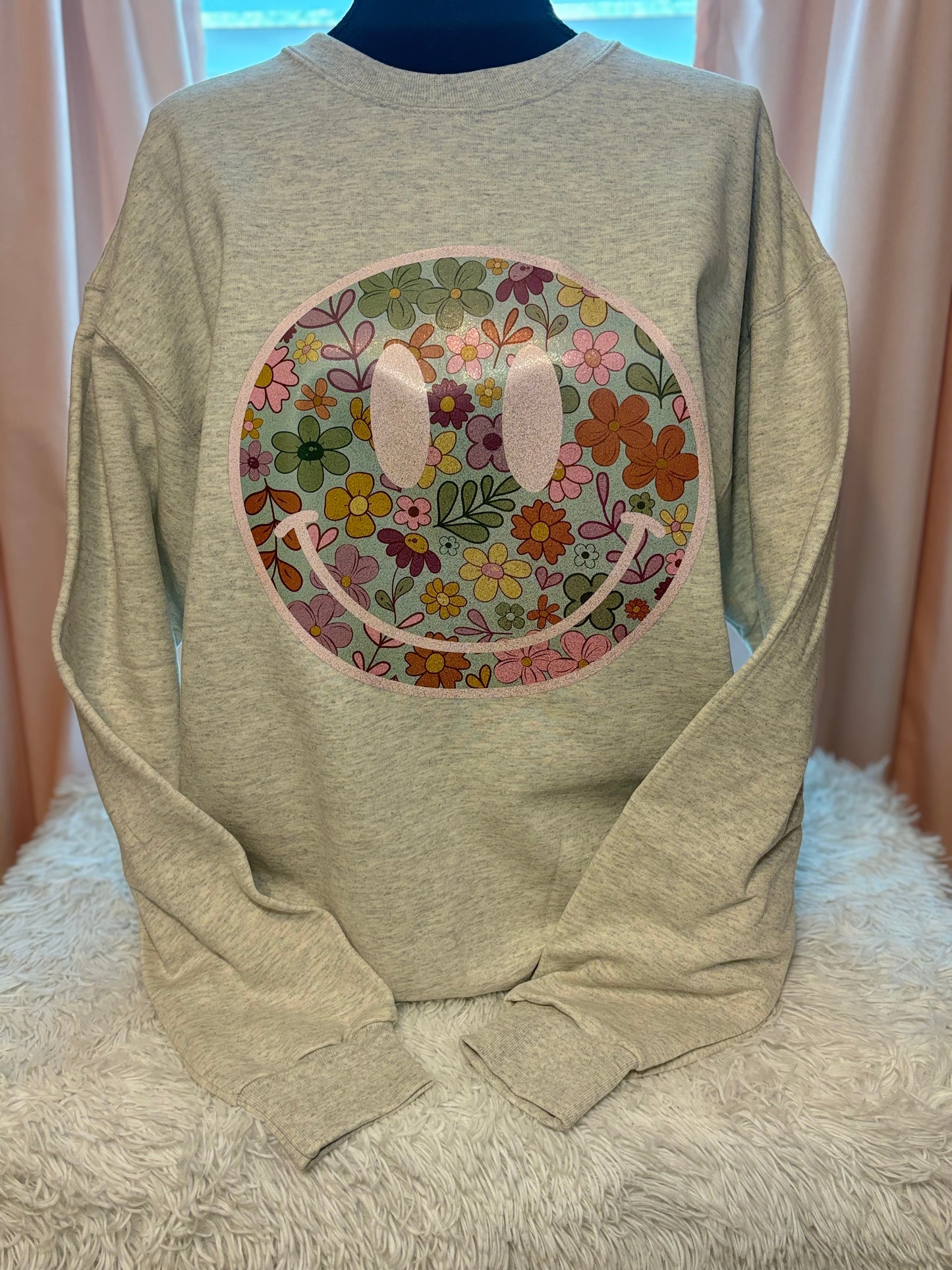 Heat press boho floral patterned face on an oatmeal heather sweatshirt