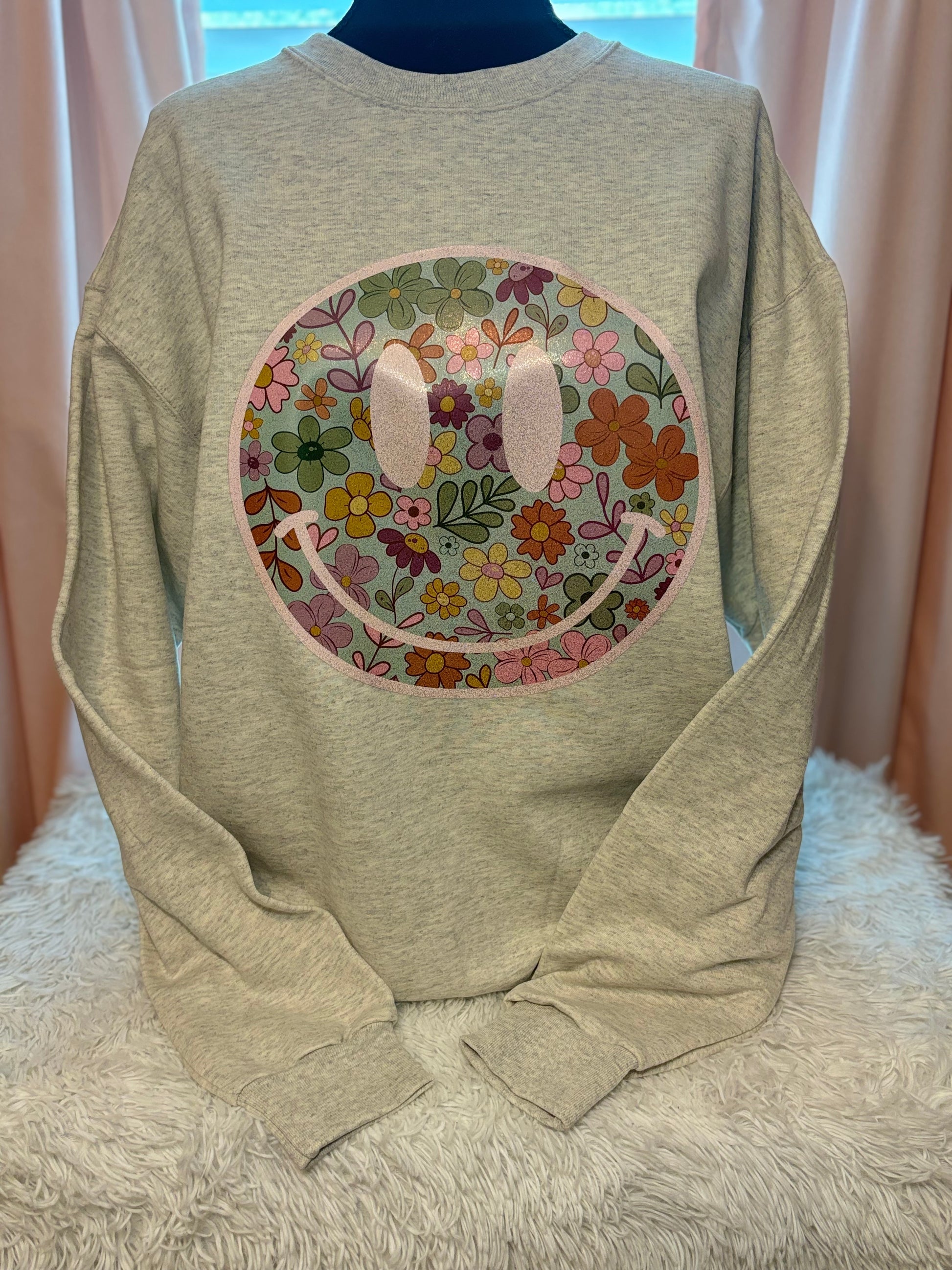 Heat press boho floral patterned face on an oatmeal heather sweatshirt