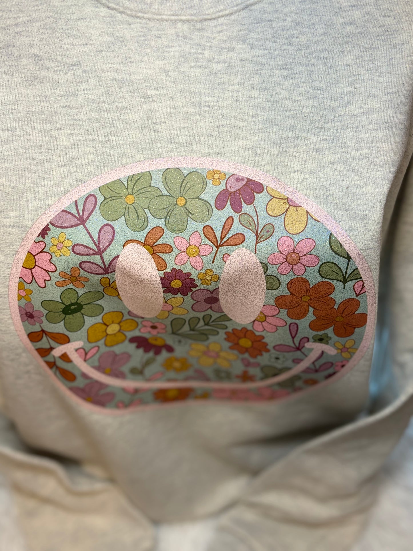 Heat press boho floral patterned face on an oatmeal heather sweatshirt