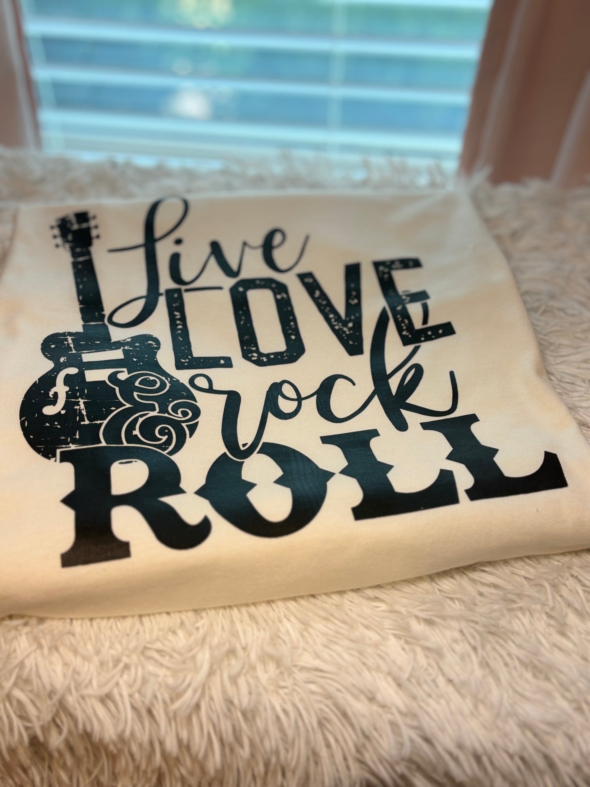 Vintage white heat press t-shirt with 'Live Love Rock & Roll' text and guitar graphic
