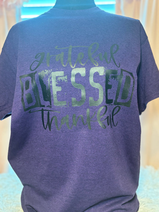 Purple heat press t-shirt with 'grateful blessed thankful' text in black