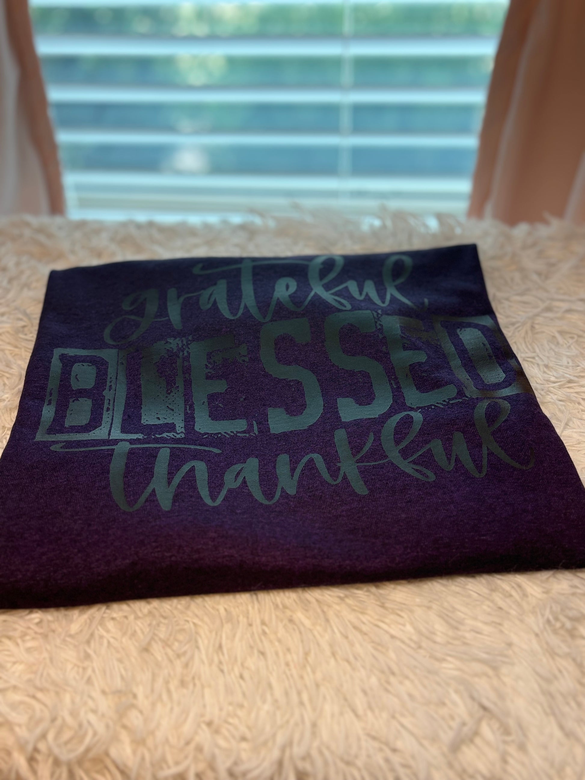 Purple heat press t-shirt with 'grateful blessed thankful' text in black