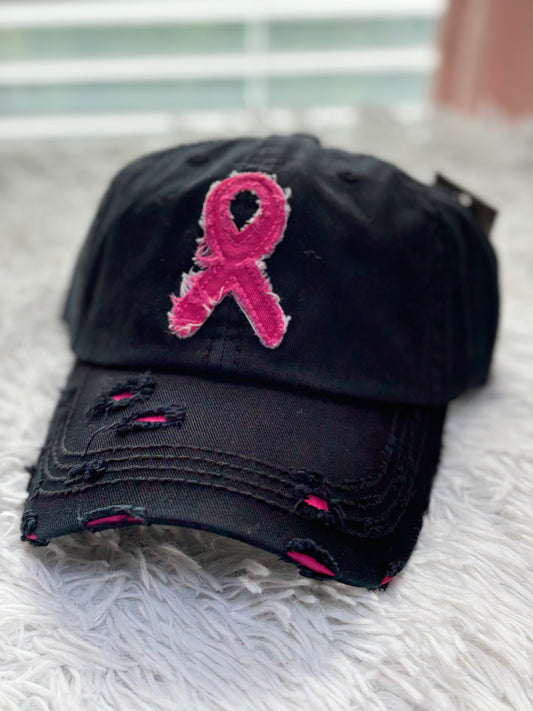 Black distressed baseball cap with a pink breast cancer awareness ribbon