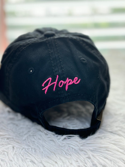 Black distressed baseball cap with a pink breast cancer awareness ribbon