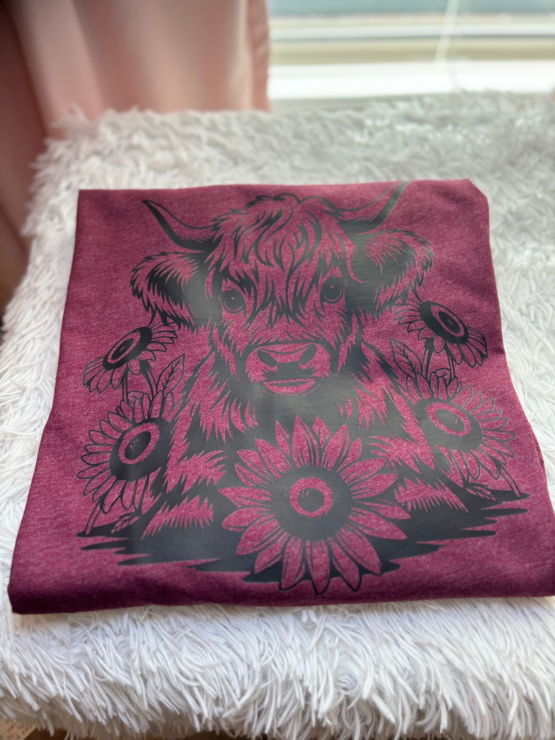 Heather maroon heat press t-shirt with black highland cow and sunflower design