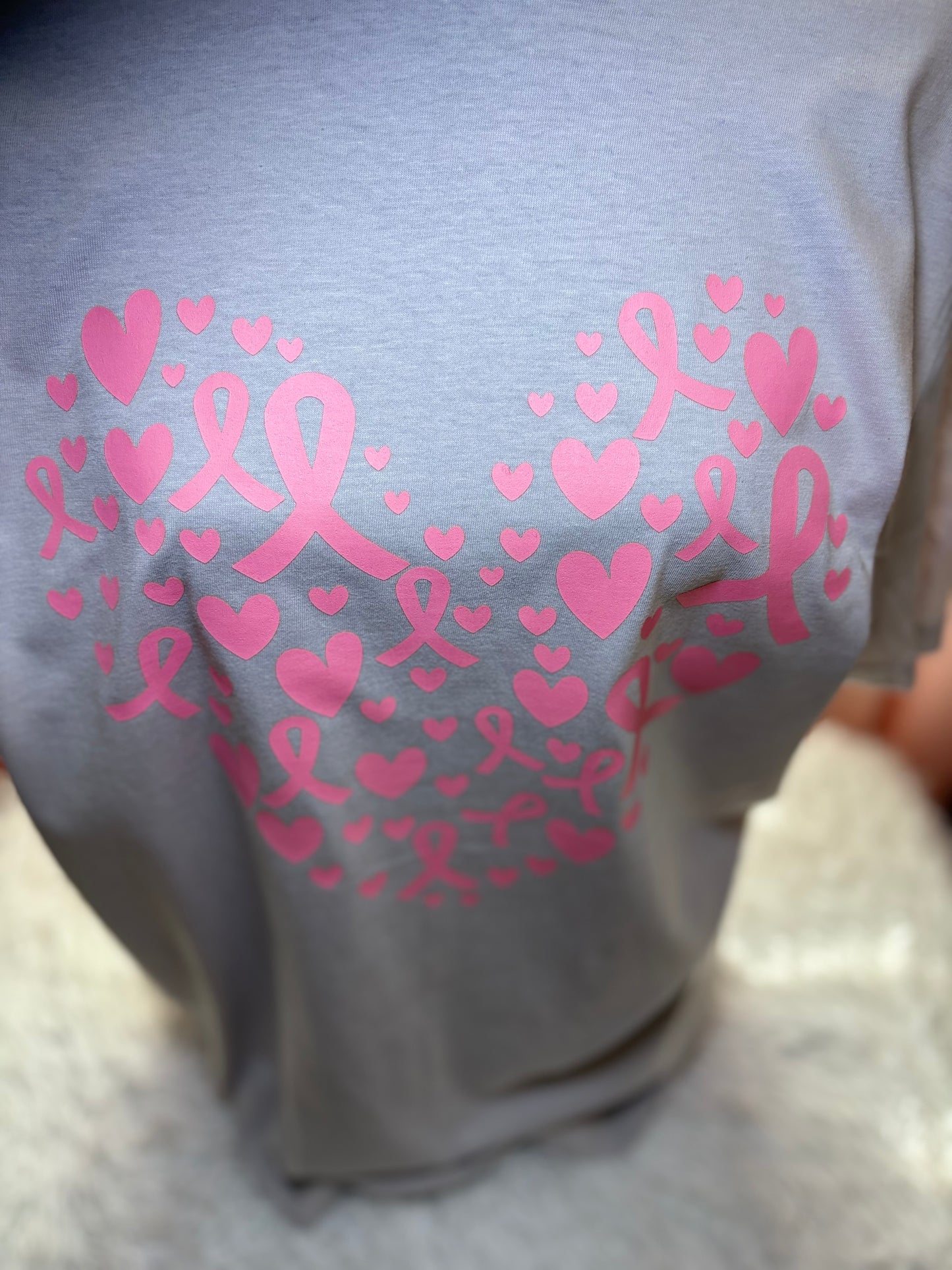 Light gray heat press t-shirt with pink hearts and breast cancer awareness ribbons