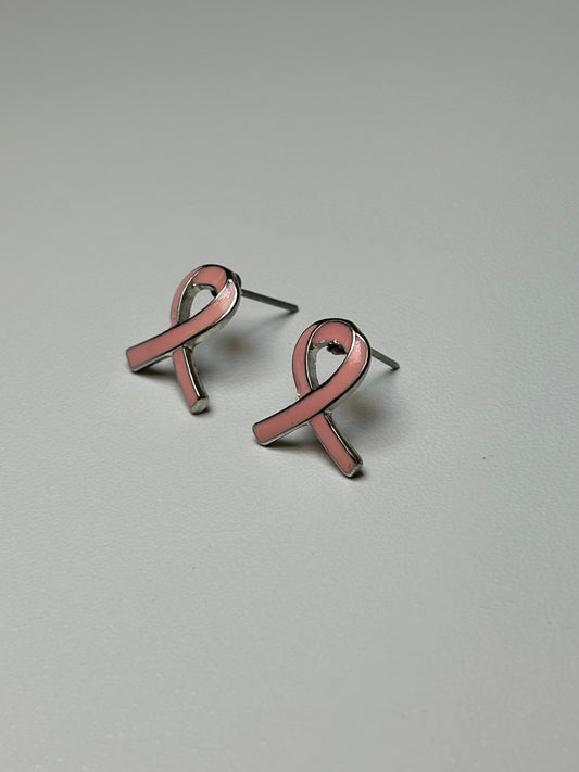 Pink ribbon earrings on a silver background