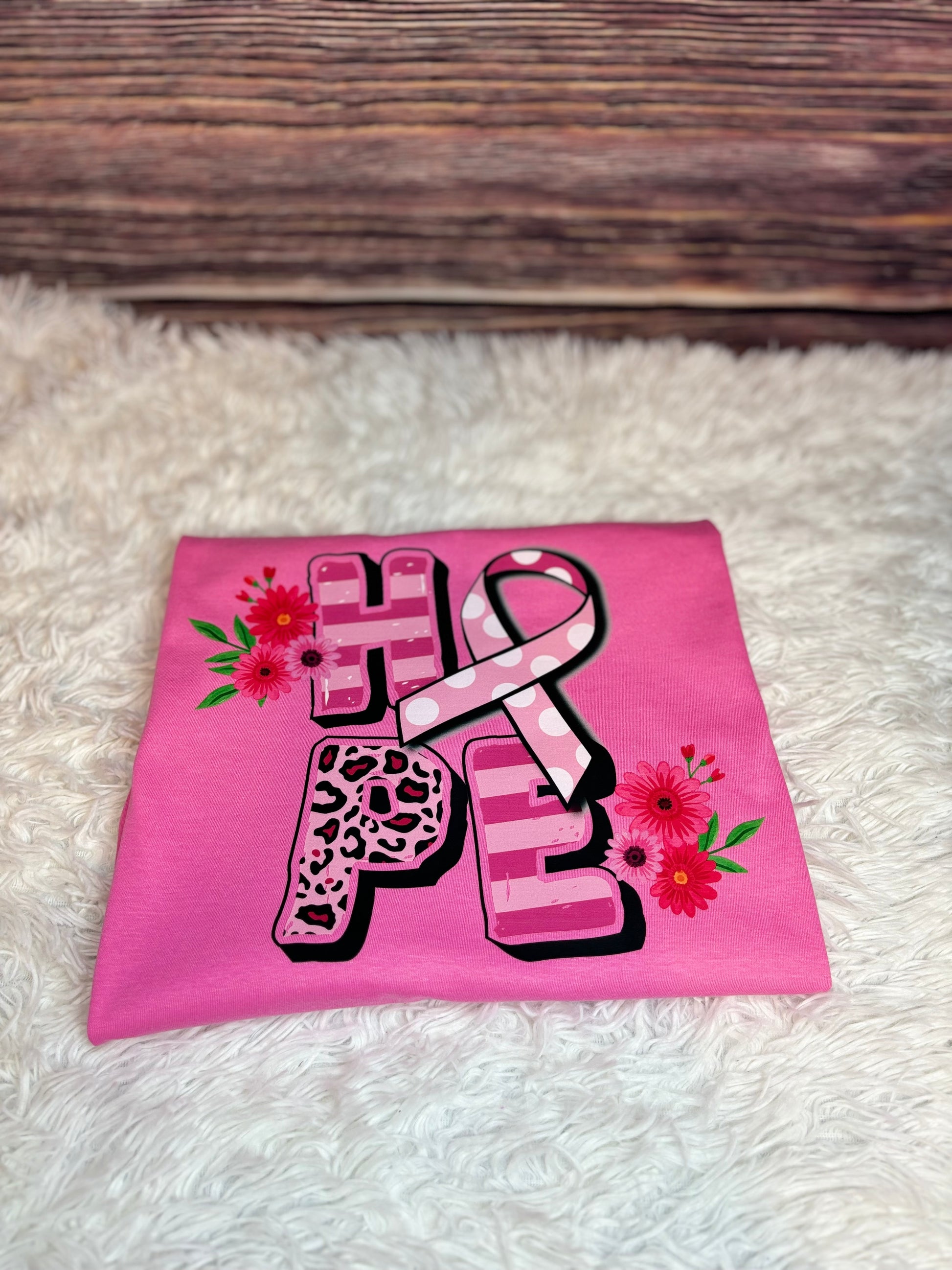 Pink heat pressed t-shirt with 'HOPE' design featuring a ribbon and flowers - Breast Cancer Awareness