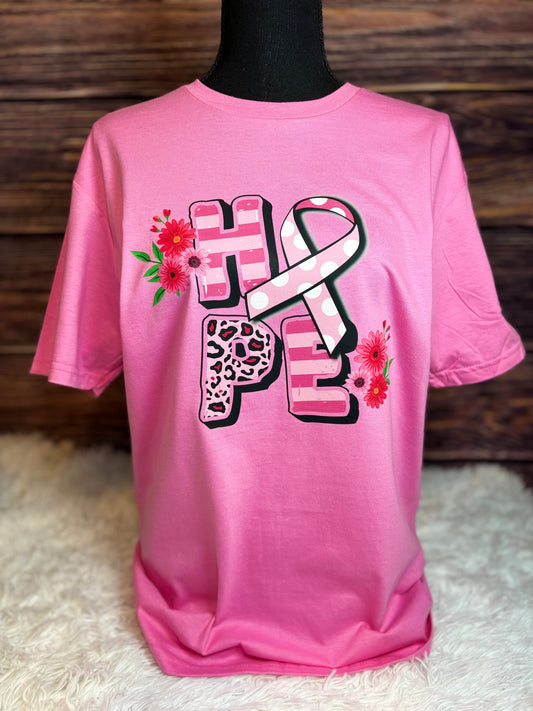Pink heat pressed t-shirt with 'HOPE' design featuring a ribbon and flowers - Breast Cancer Awareness