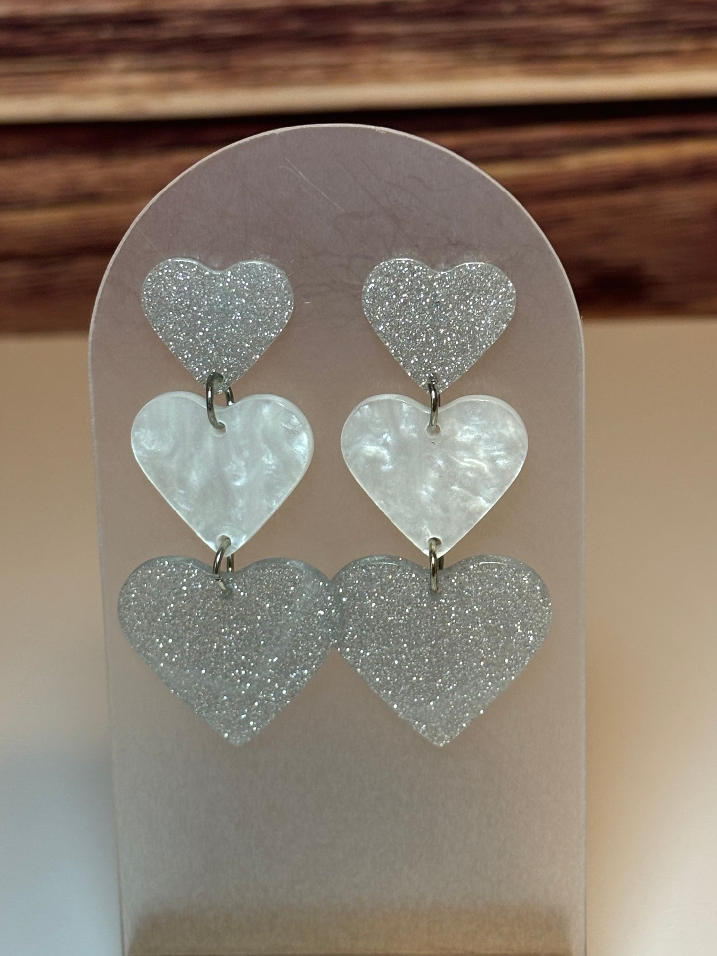 Triple Heart Acrylic Dangle Earrings – Silver Glitter & Pearl White