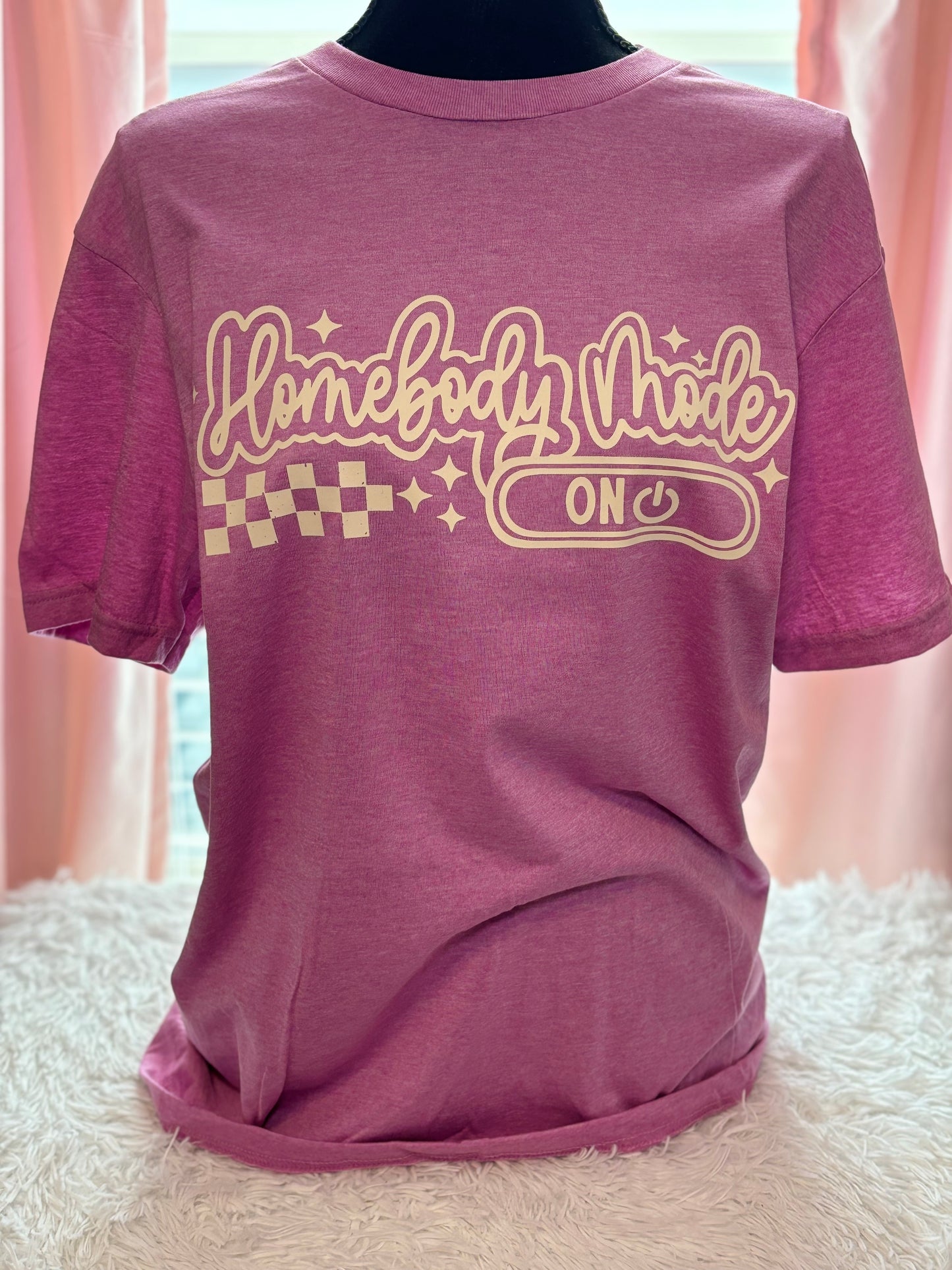 Heather Orchid heat press t-shirt with 'Homebody Mode ON' text in beige