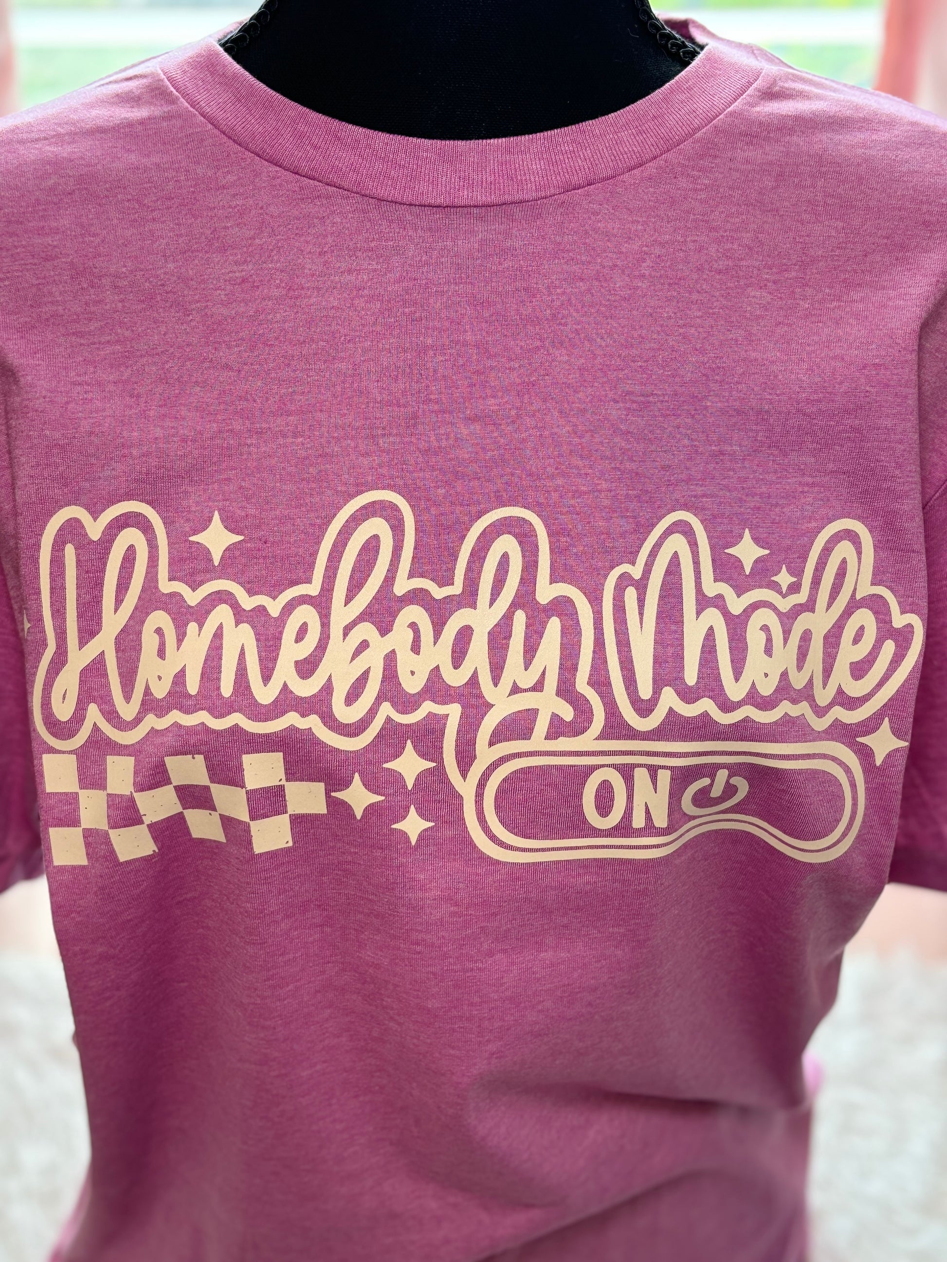 Heather Orchid heat press t-shirt with 'Homebody Mode ON' text in beige