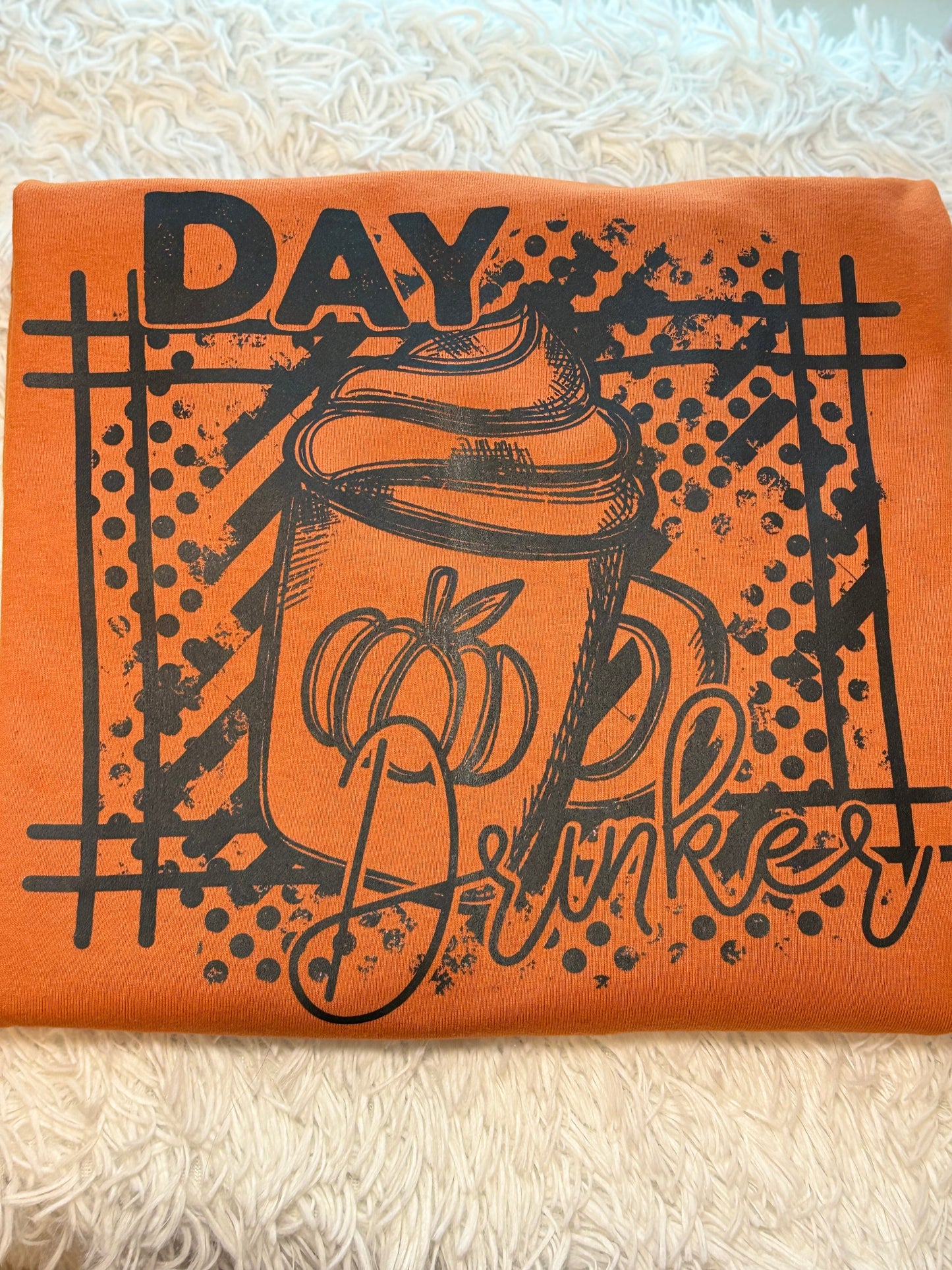 Orange long sleeve t-shirt with black graphic heat press design- Day Drinker latte