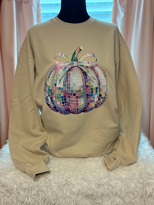Heat pressed beige sweatshirt with a glitter disco pumpkin design