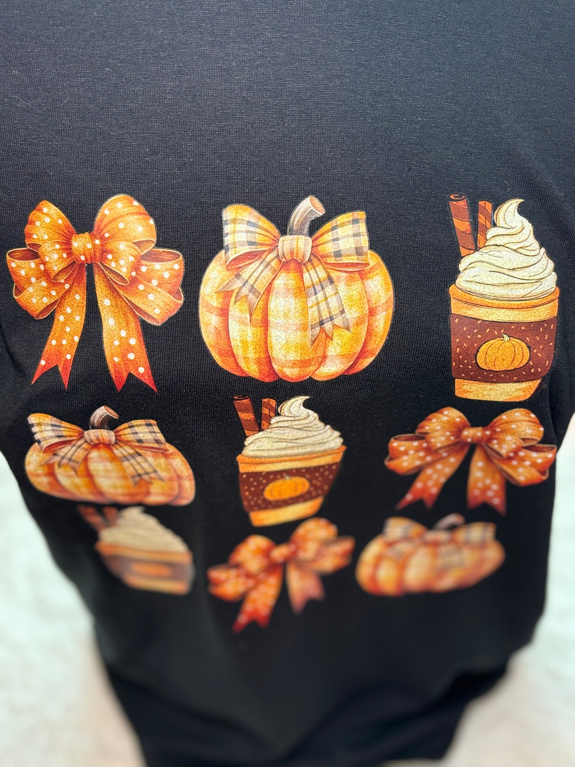 Black heat press t-shirt with glitter fall-themed graphics- Bows, pumpkin, latte